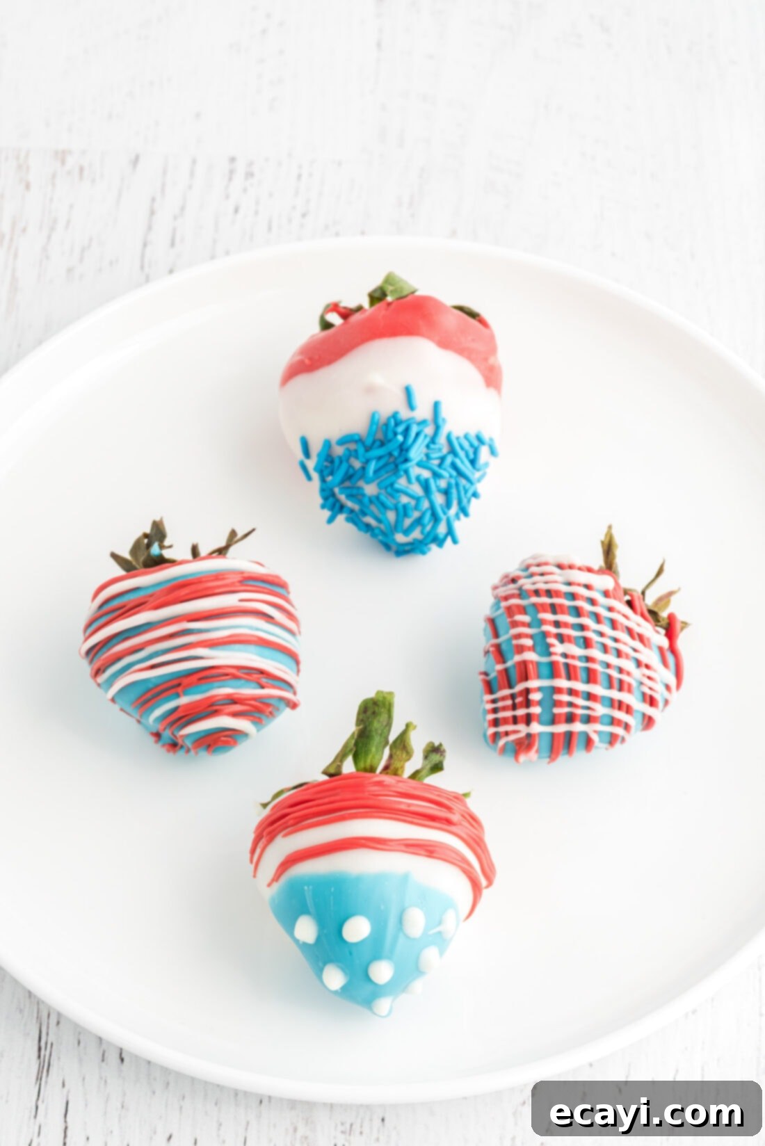 Stars & Stripes Strawberry Bites 2 Patriotic Chocolate Covered Strawberries on a plate