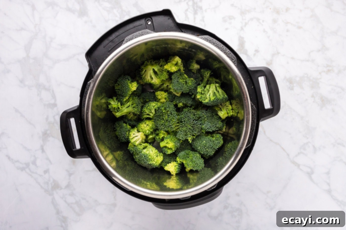 Perfect Instant Pot Broccoli 5 broccoli florets in instant pot with water