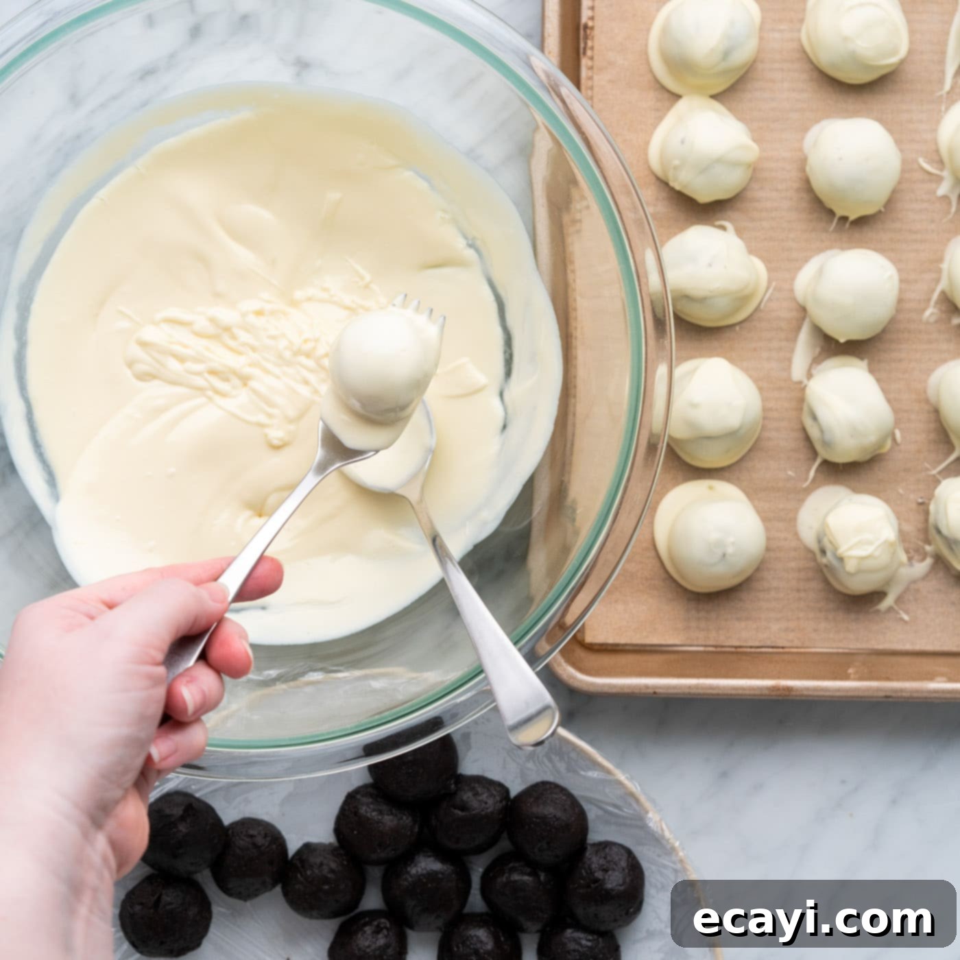 Stars and Stripes Oreo Truffles 12 Dipping an oreo truffle into melted white chocolate
