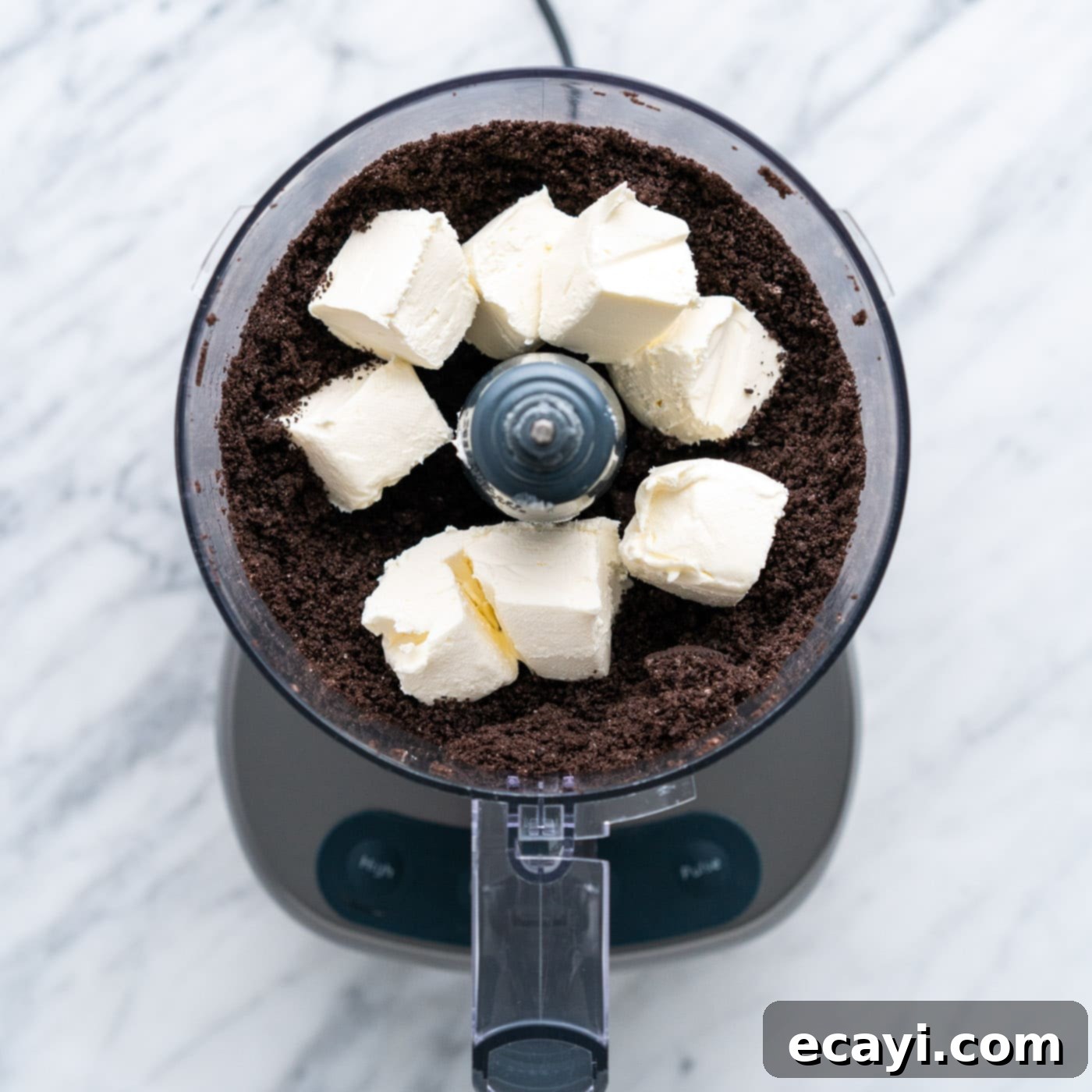 Stars and Stripes Oreo Truffles 6 Cubed cream cheese added to food processor with oreo crumbs