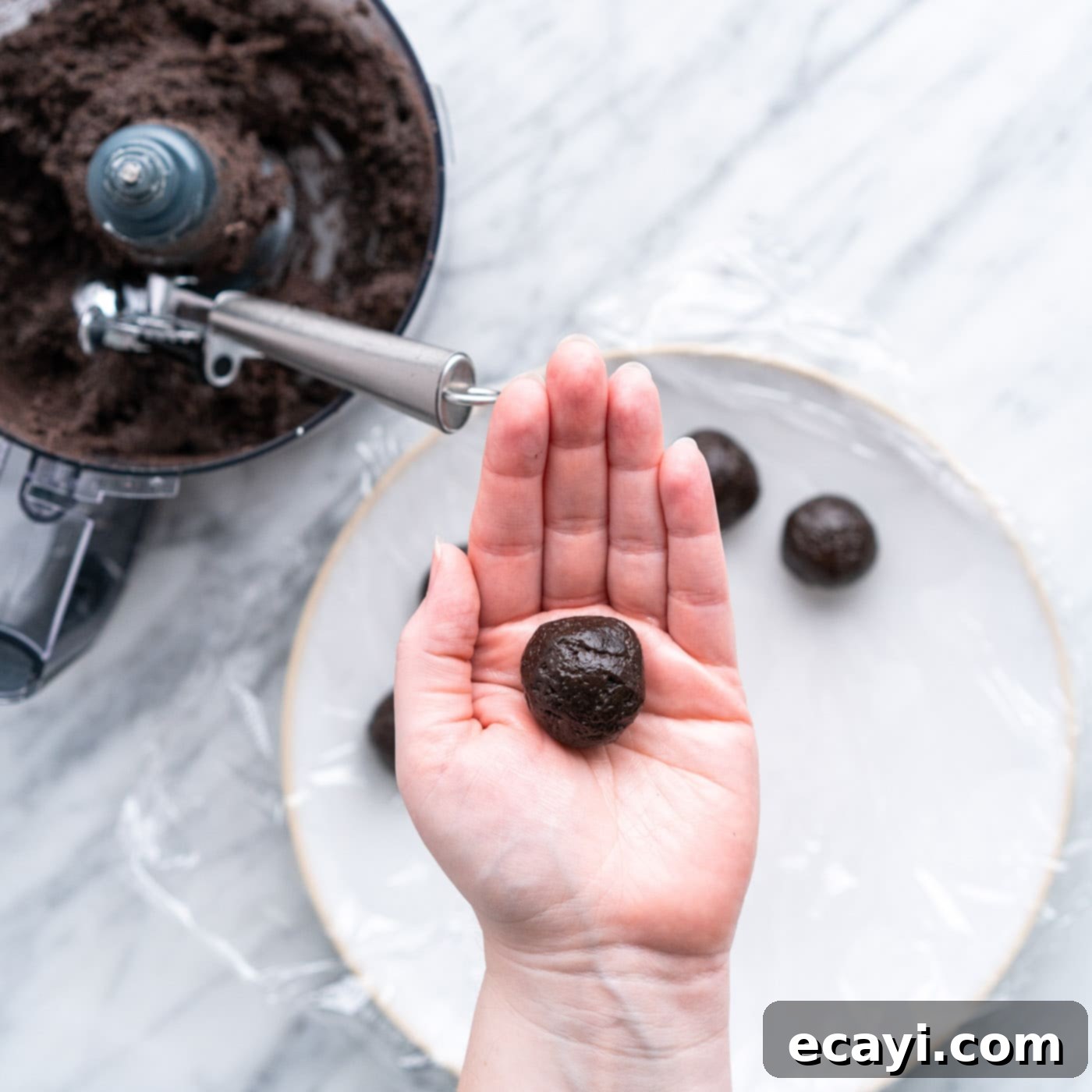 Stars and Stripes Oreo Truffles 9 Rolling an oreo truffle mixture into a perfect ball