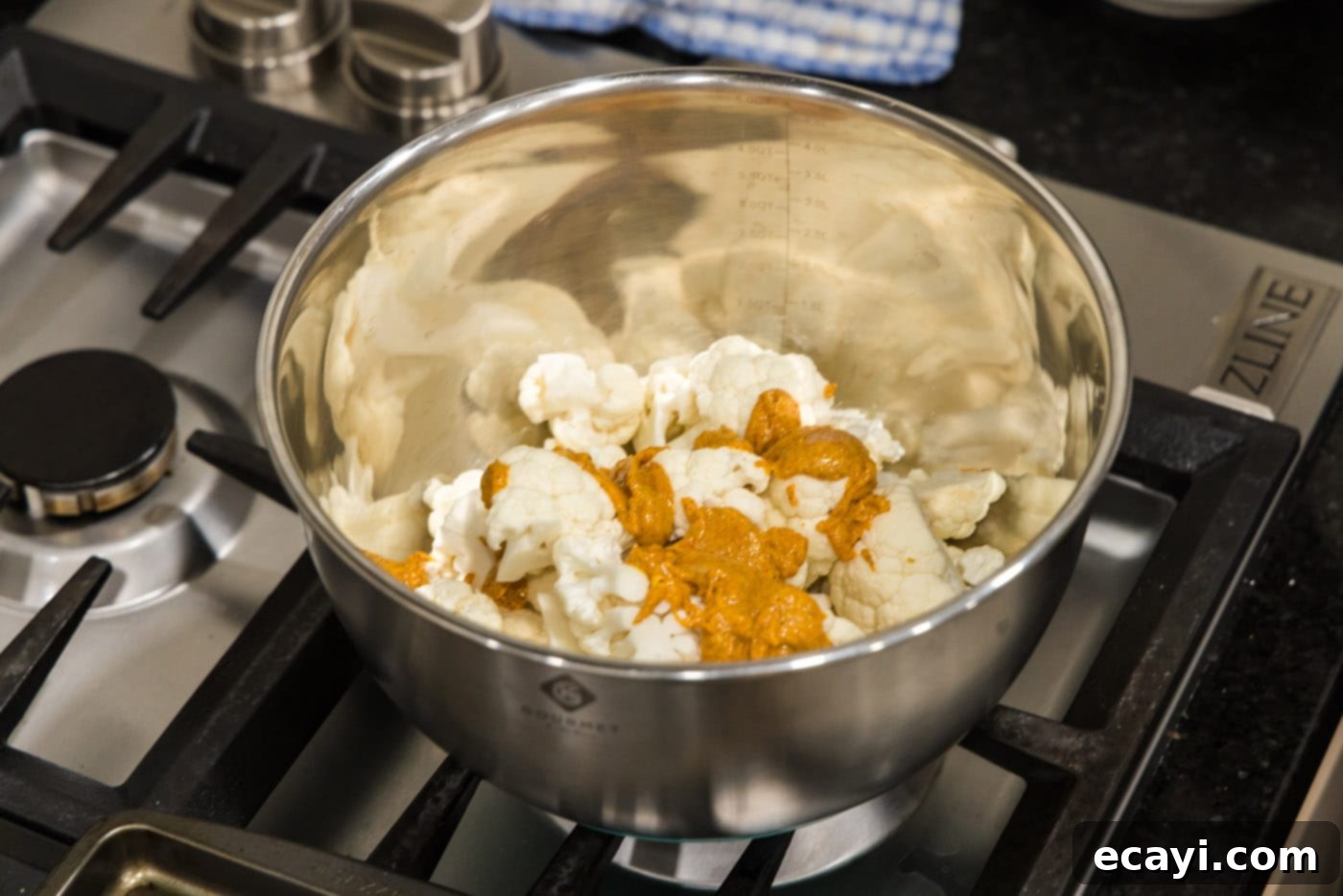Blistered Spicy Cauliflower 7 cauliflower florets with spice rub in a bowl
