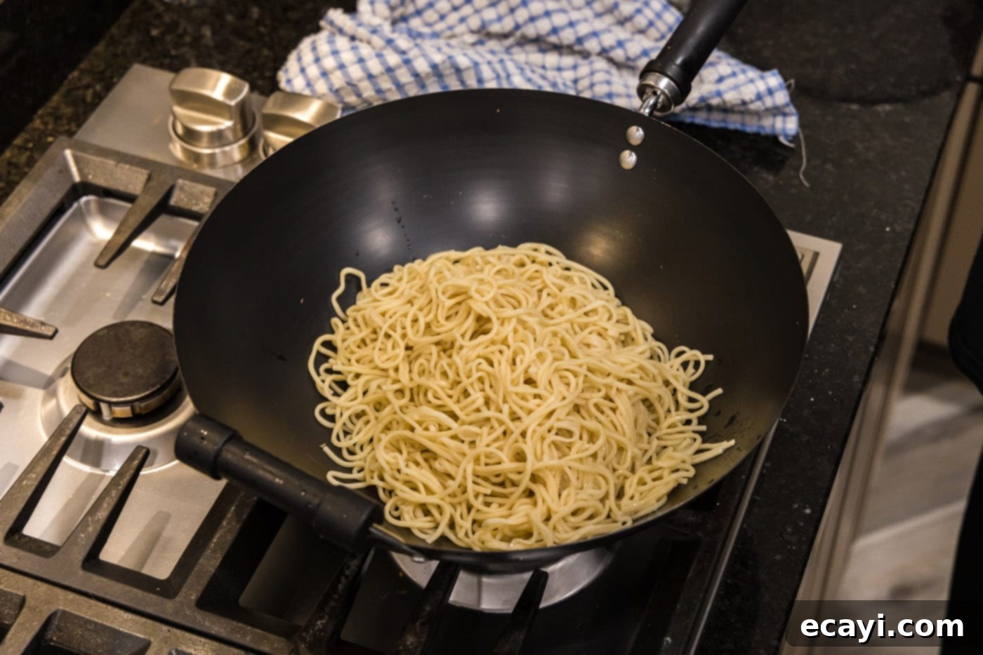 Sweet Sticky Teriyaki Noodles 6 lo mein noodles in a wok