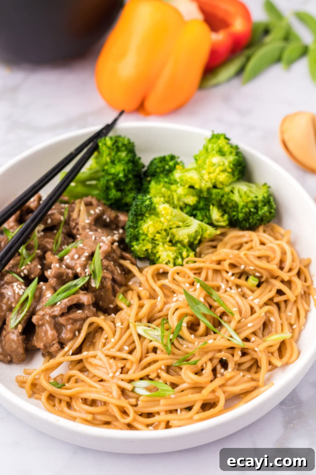 Sweet Sticky Teriyaki Noodles 10 Teriyaki Noodles plated with broccoli and beef teriyaki