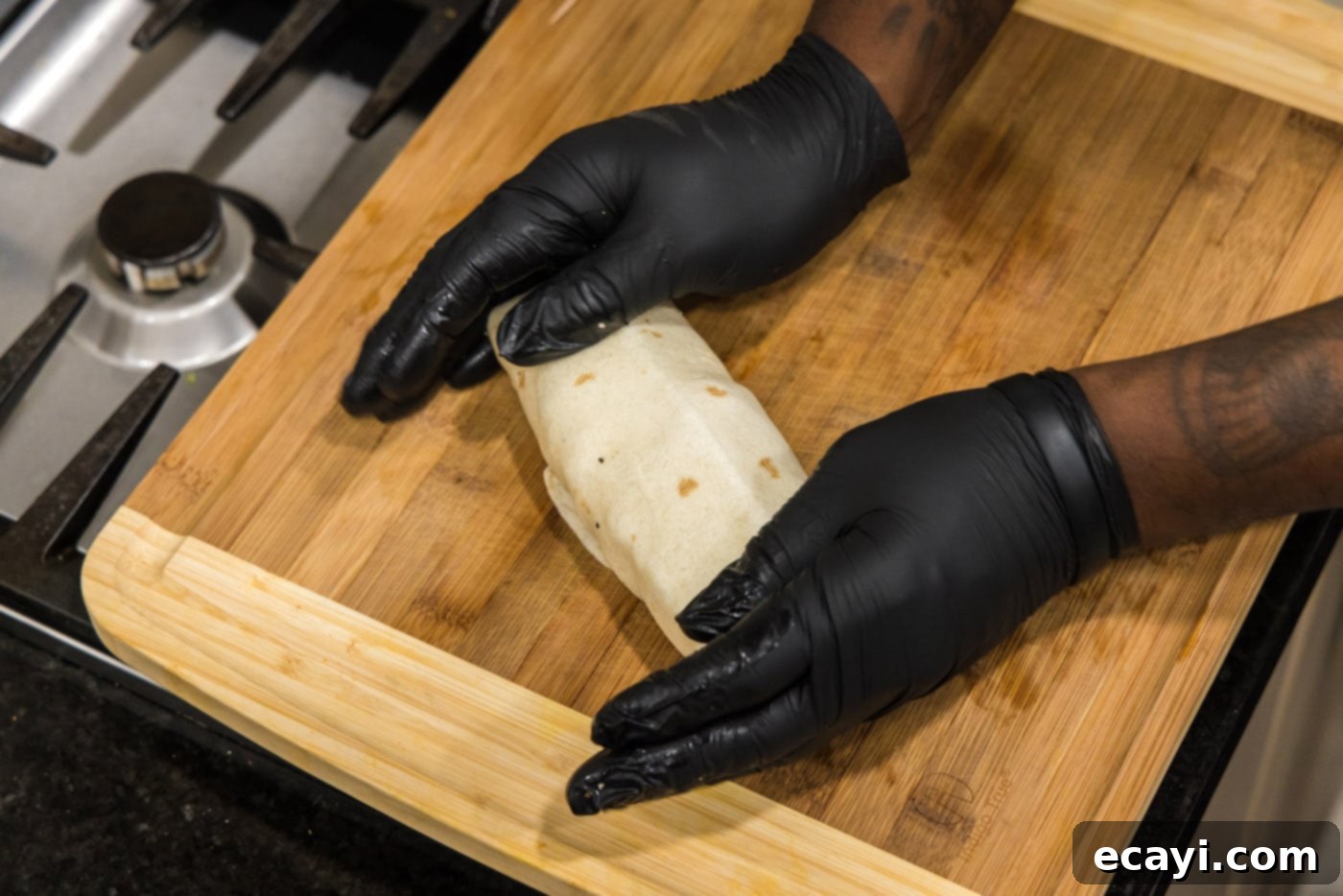 Signature Chicken Bacon Ranch Wrap 14 hands holding chicken bacon ranch wrap