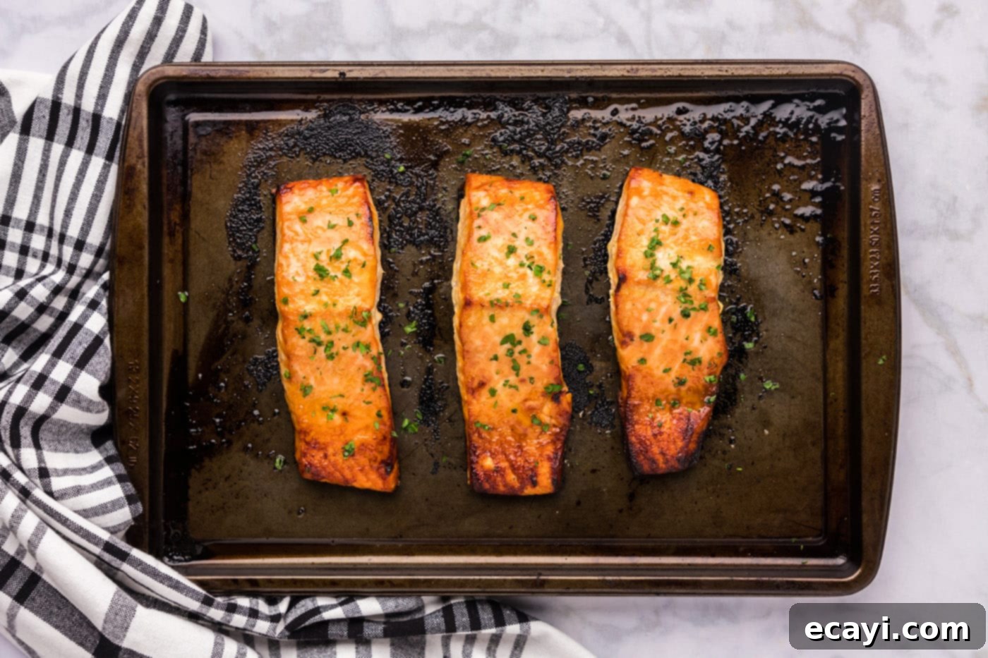 Caramelized Salmon 9 Finished baked brown sugar salmon, glistening with caramelized glaze, fresh out of the oven.