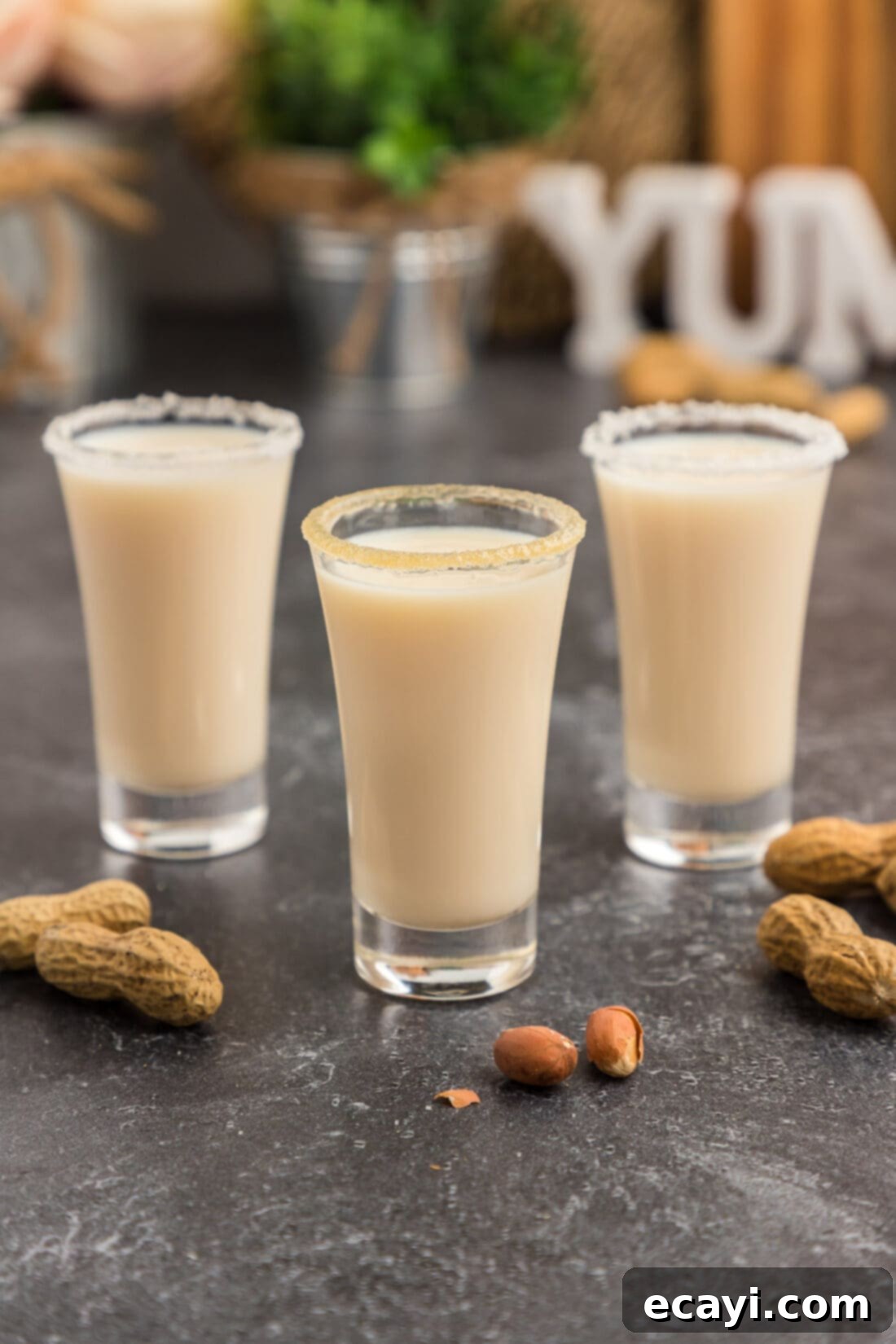 Salted Caramel Nut Blast 3 Three Salted Nut Roll Shots lined up on a serving tray, ready to be enjoyed