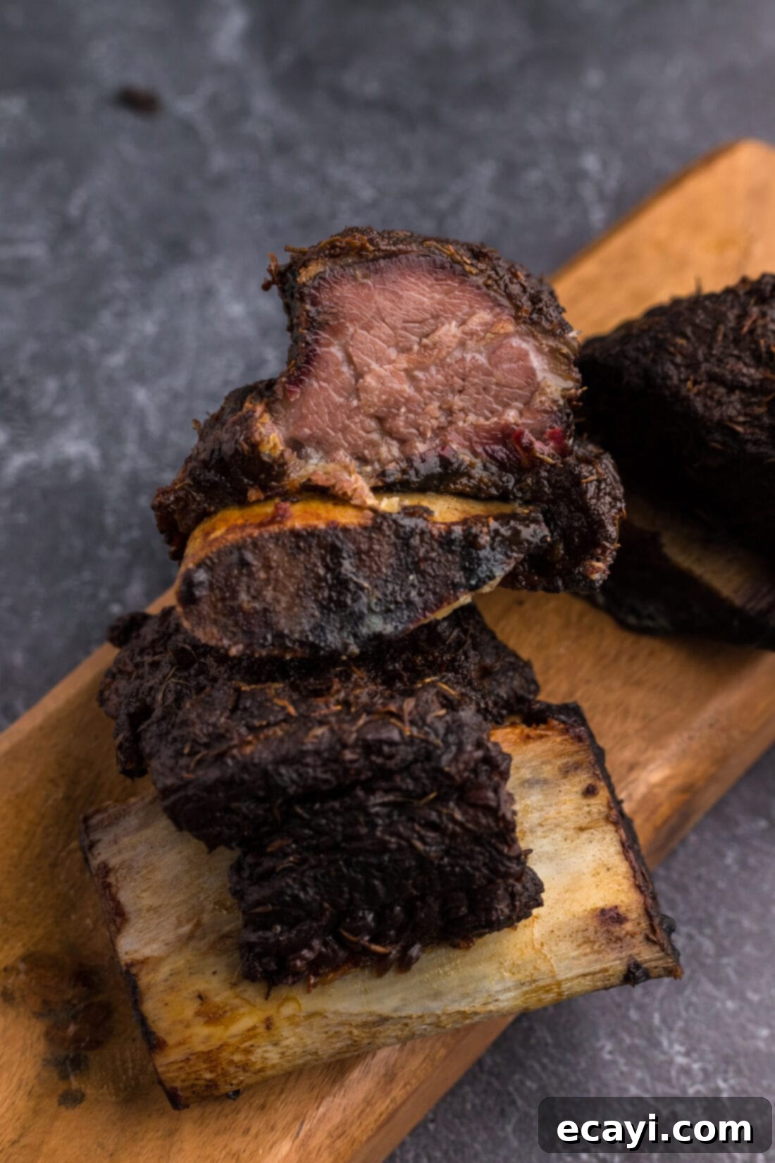 Melt in Your Mouth Smoked Short Ribs 3 Smoked Beef Short Rib stacked on another Smoked Beef Short Rib, showcasing the rich color and texture