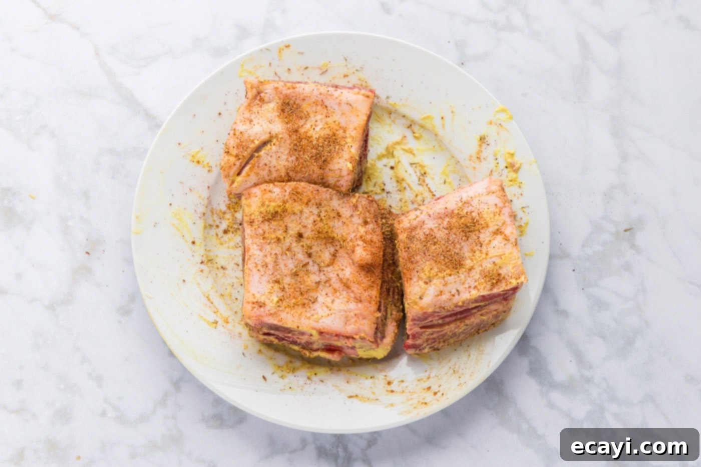 Melt in Your Mouth Smoked Short Ribs 7 seasoned beef short ribs with Dijon mustard