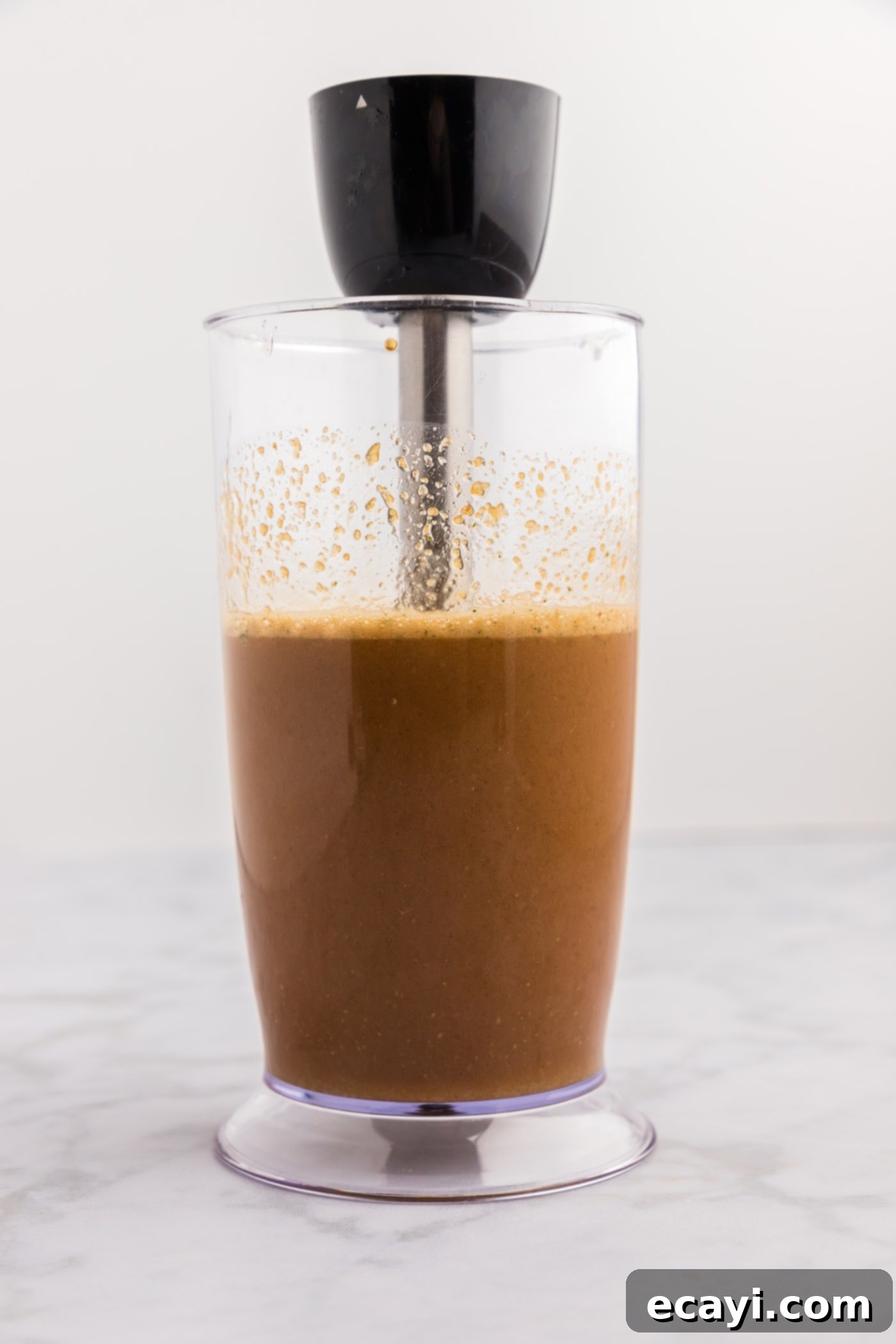 Sticky Honey Garlic Chicken 5 marinade ingredients in an immersion blender