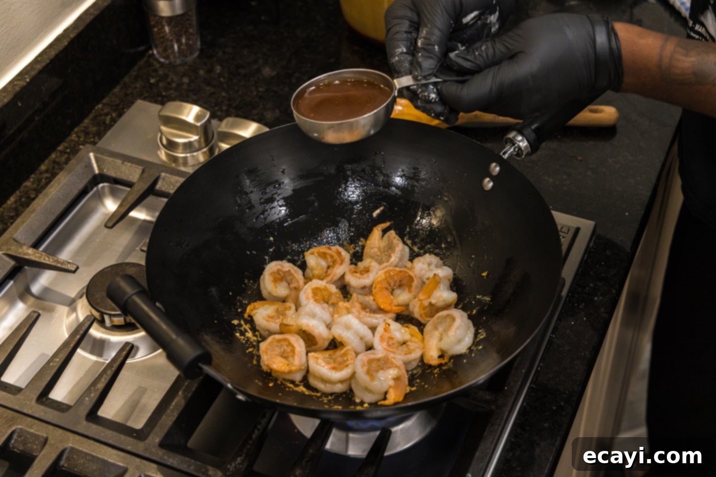 Teriyaki Shrimp 8 adding teriyaki sauce to shrimp in skillet