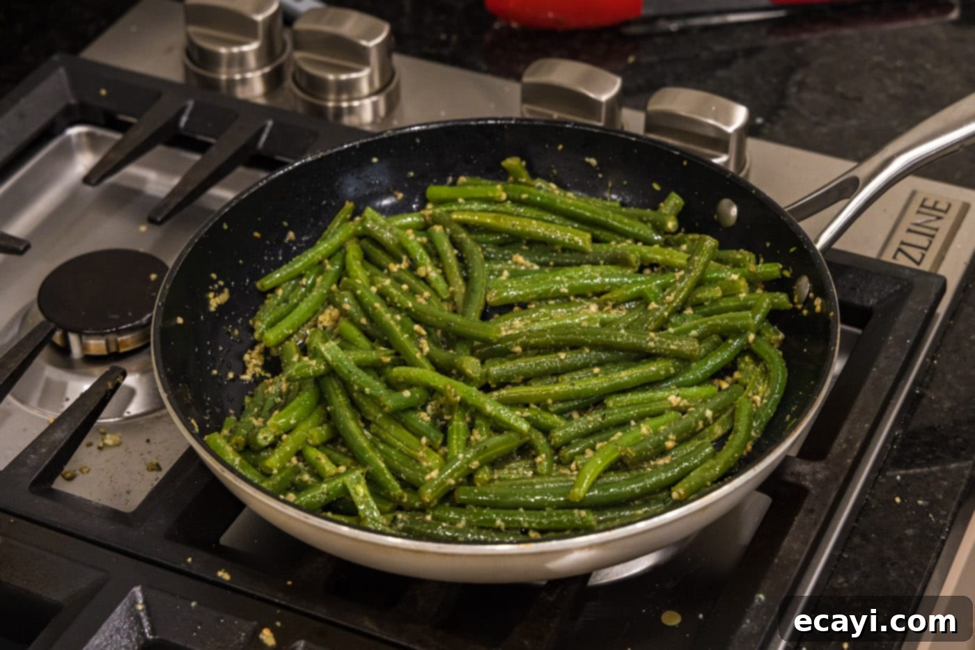 Garlic-Kissed Green Beans 9 sauteed garlic green beans perfectly cooked in a skillet