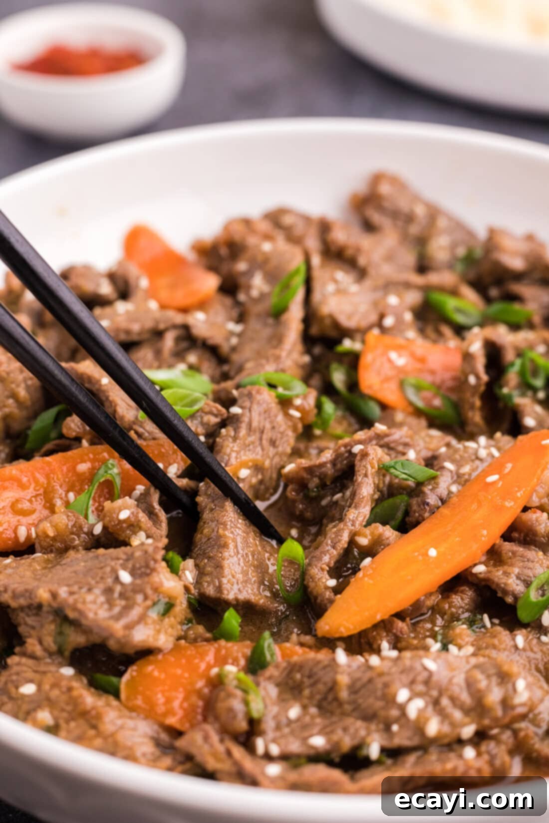 Classic Korean Beef Bulgogi 2 Chopsticks in a bowl of Beef Bulgogi