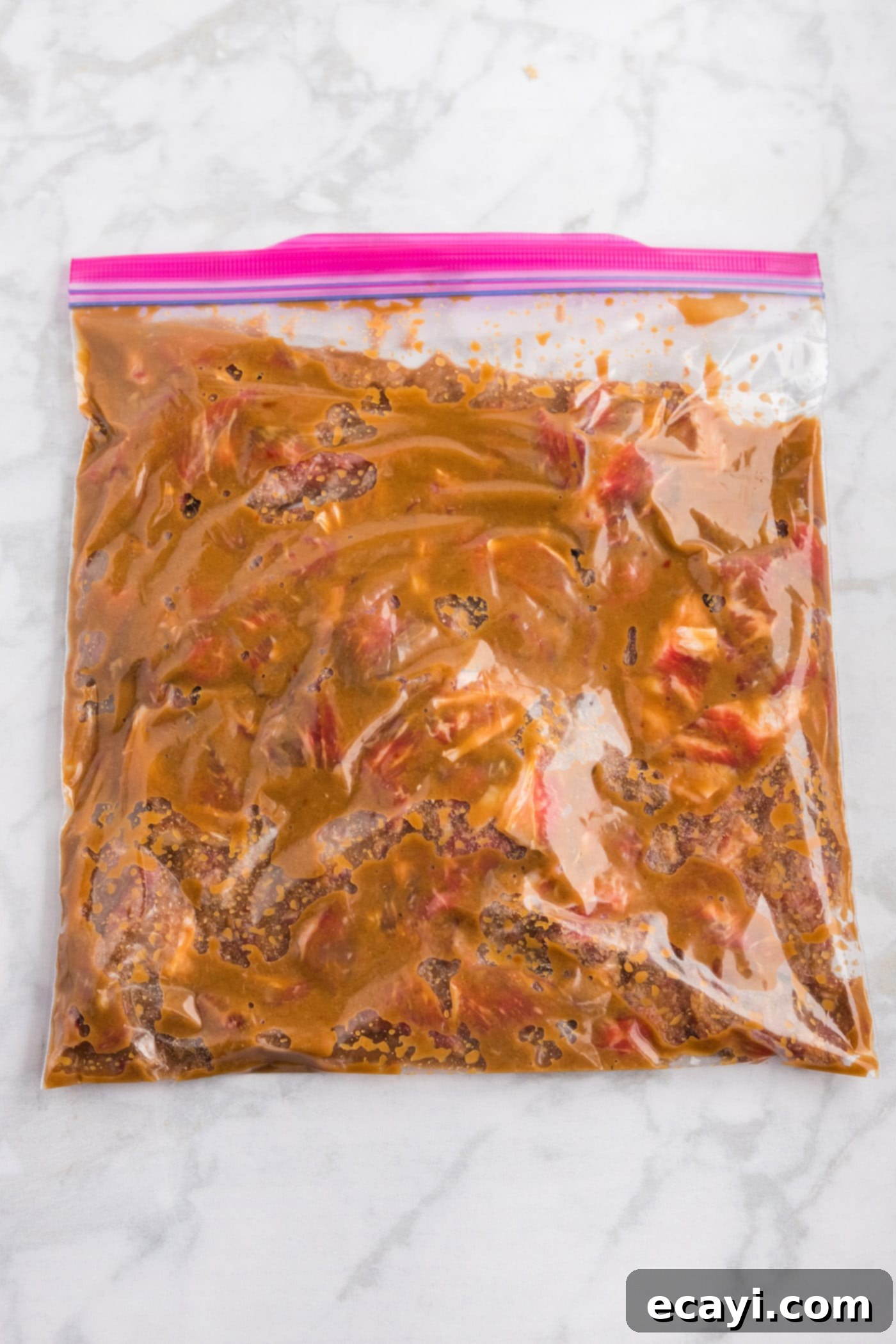 Classic Korean Beef Bulgogi 7 marinating ribeye steak in a large ziptop bag