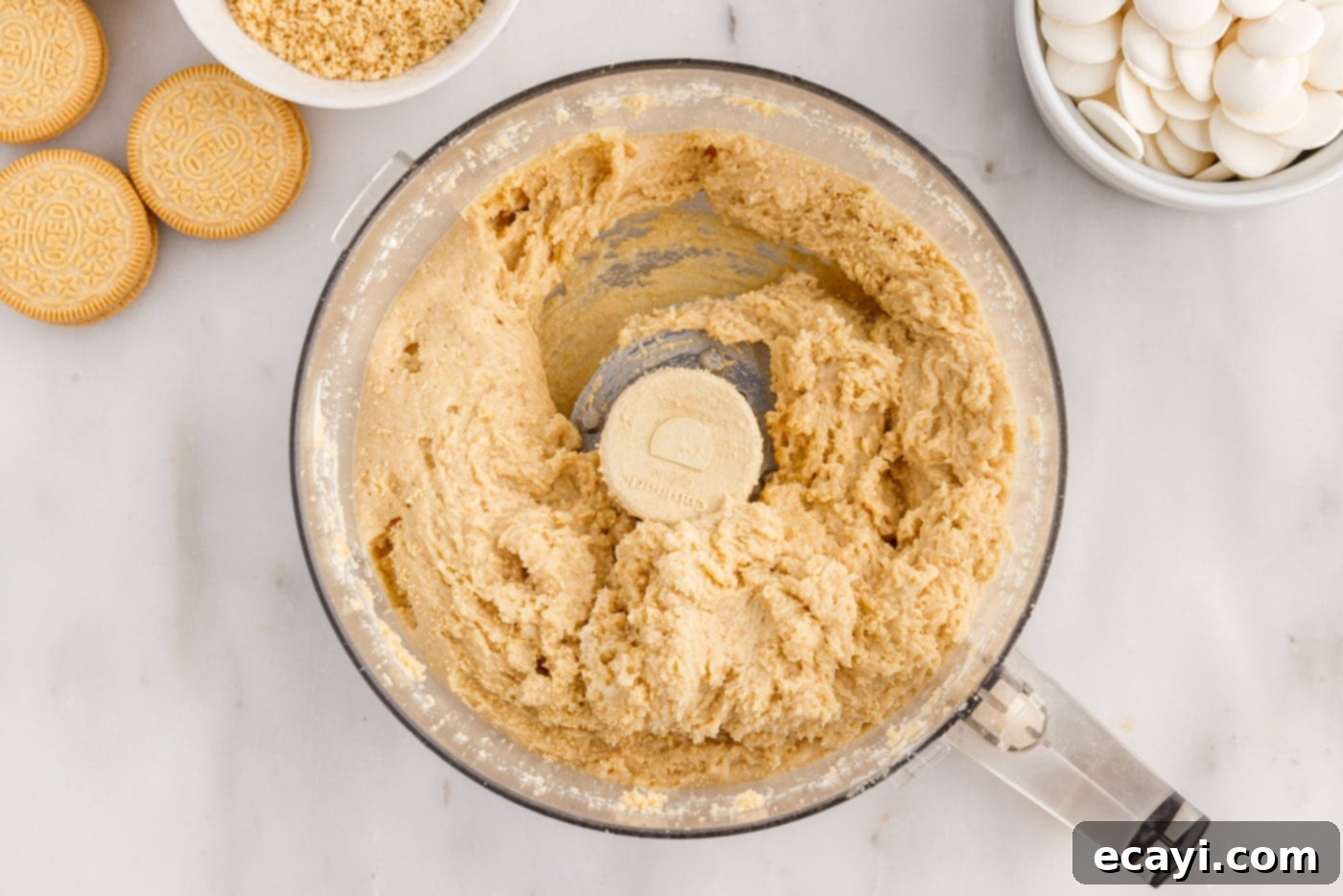 No-Bake Golden Oreo Bliss 9 The cream cheese and Golden Oreo mixture, now a cohesive dough, in the food processor.