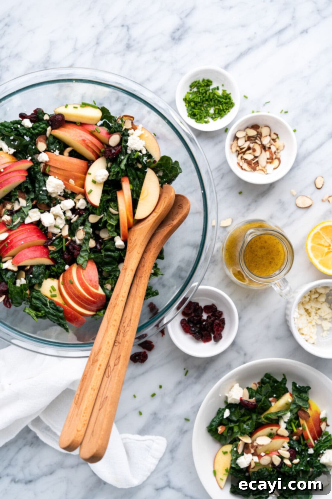Zesty Lemon Vinaigrette 7 Bowl of kale salad with Lemon Salad Dressing and other topping on the side