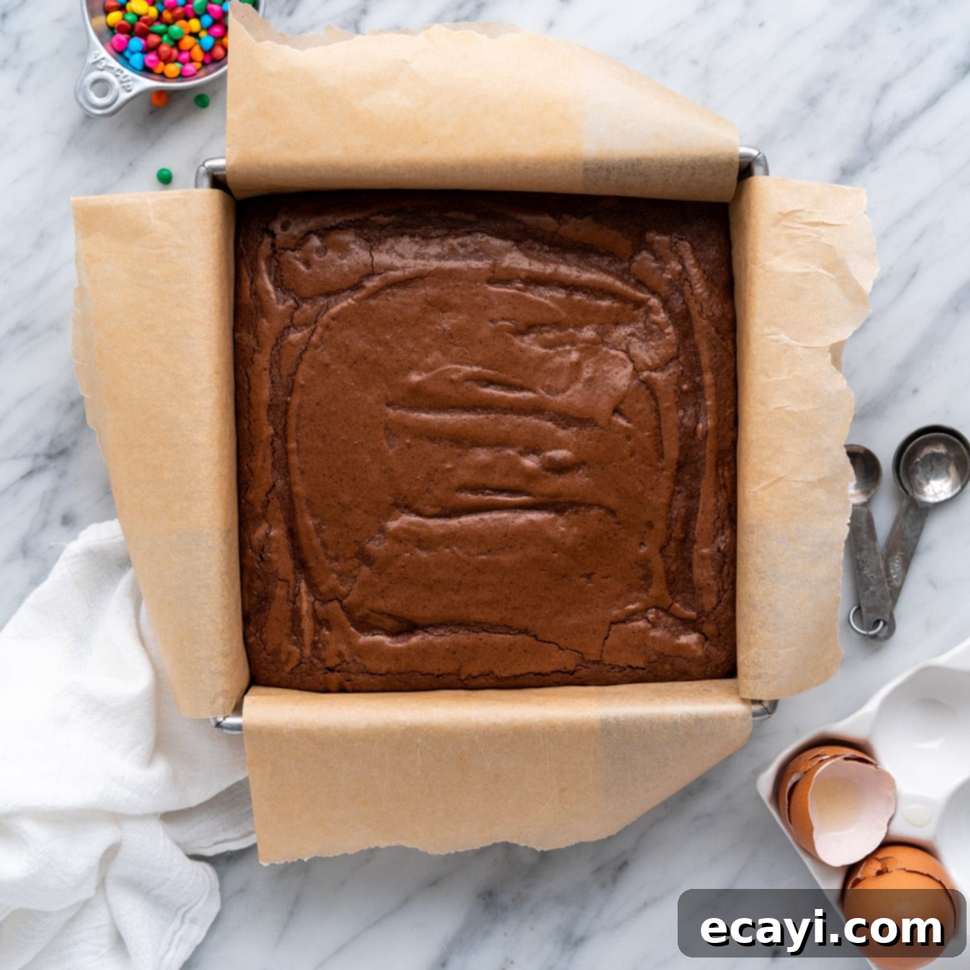 Dark Matter Delights 15 Finished brownies baked in a baking dish, with a perfectly crackled top and set edges.