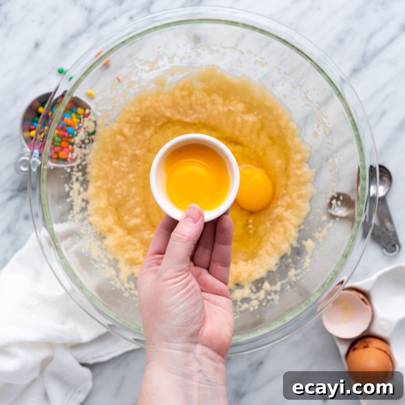 Dark Matter Delights 10 Adding one large egg yolk to the brownie batter, enhancing richness and fudginess.