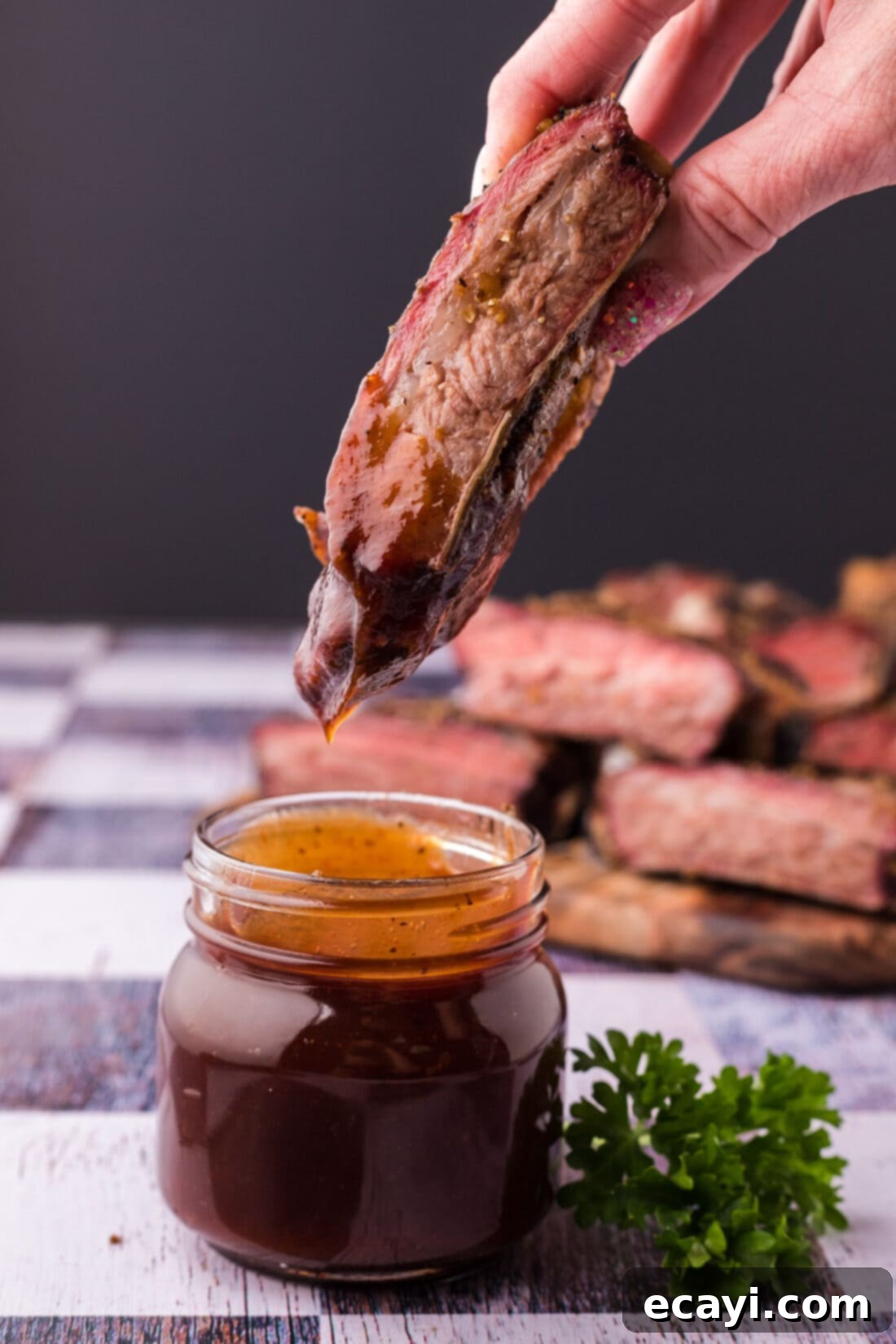Pitmaster's Smoked Beef Ribs 3 Smoked Beef Rib dipped in barbecue sauce