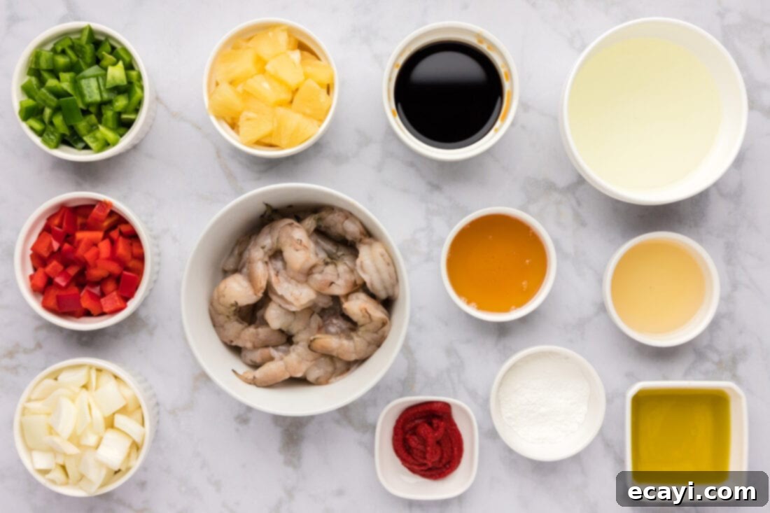 Tangy Prawn Delight 4 A display of fresh ingredients for Sweet and Sour Shrimp, including shrimp, bell peppers, onions, pineapple, and sauce components.