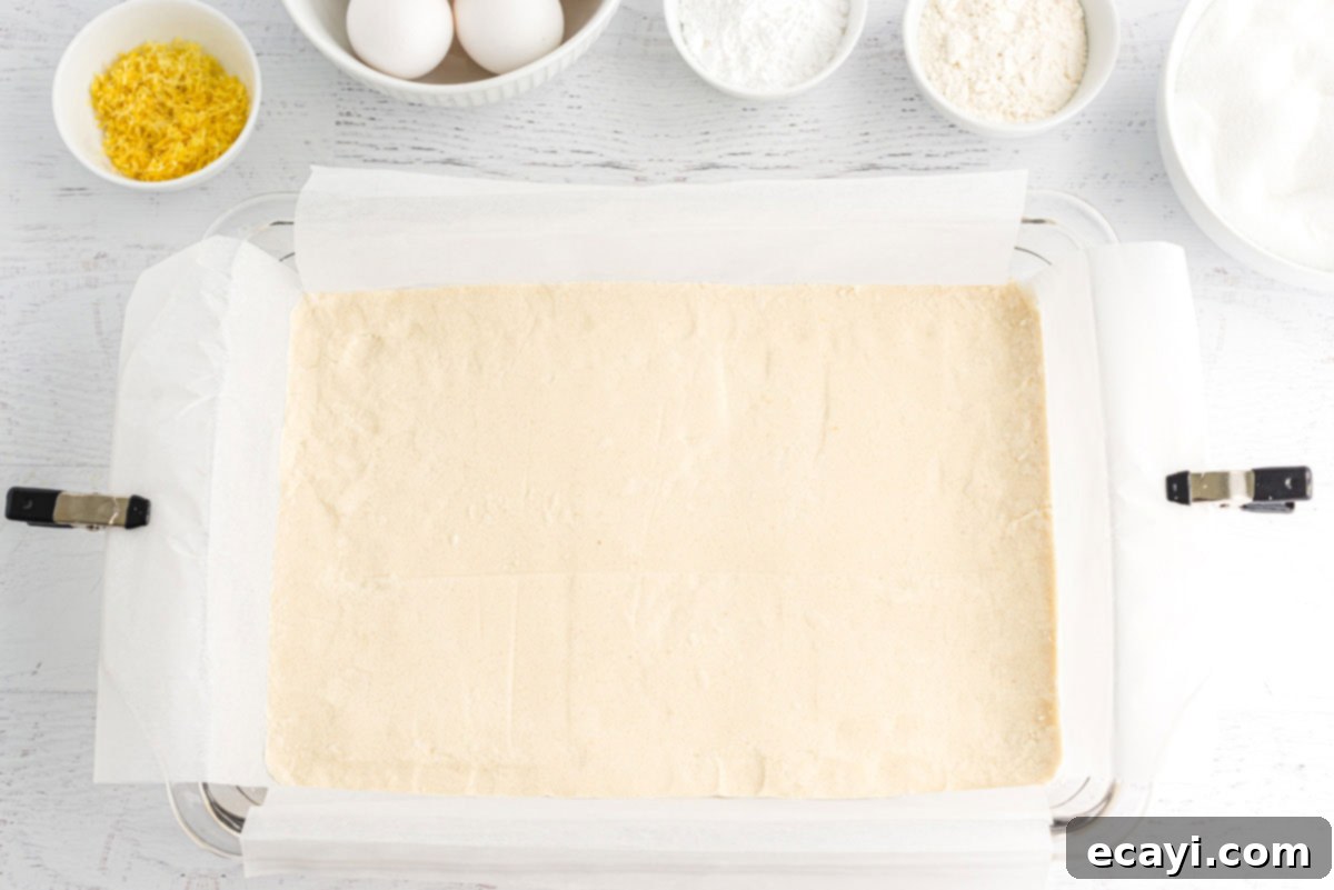 Zesty Lemon Bars 5 shortbread mixture patted into a crust