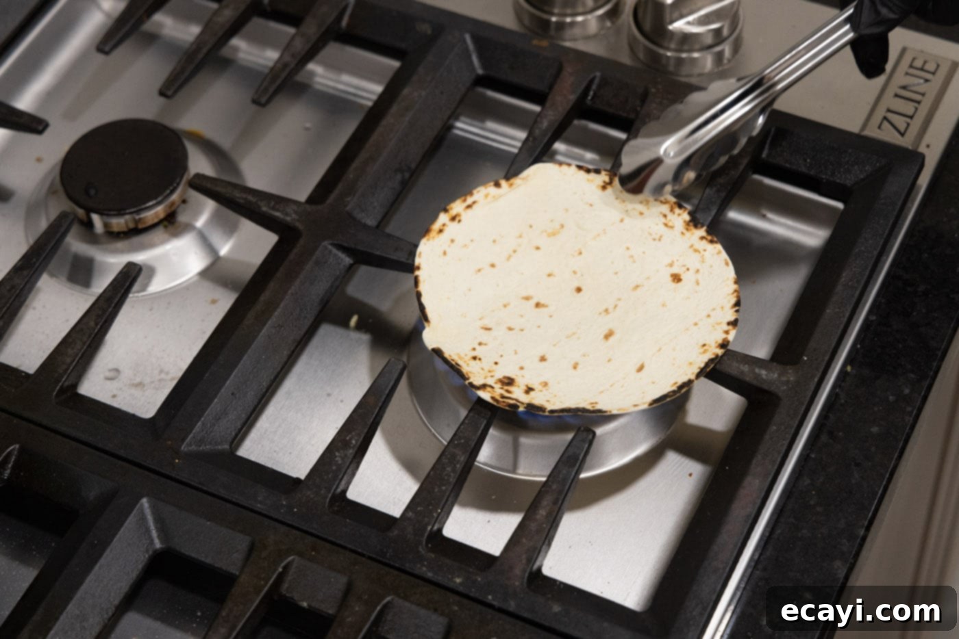 Sizzling Steak Fajitas 13 charring corn tortillas over oven flame
