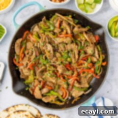 Sizzling Steak Fajitas 15 Steak Fajitas in a cast iron skillet