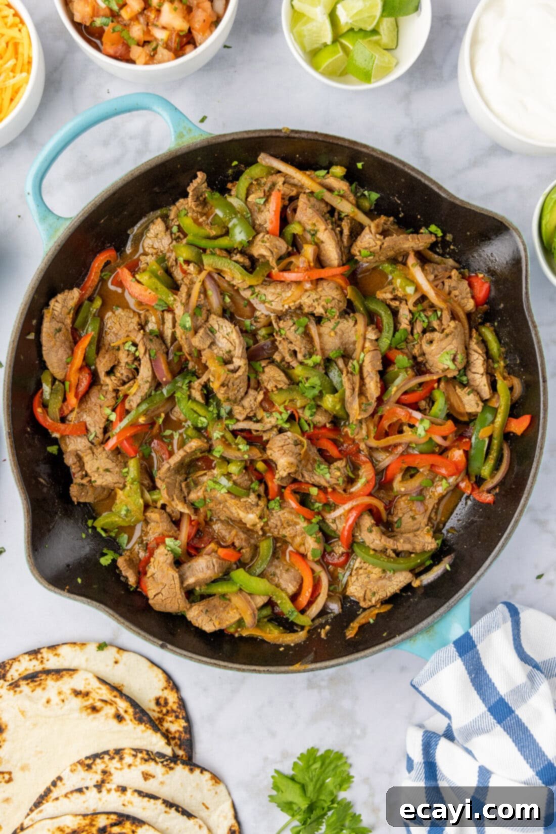Ultimate Fajita Marinade 8 Sizzling steak fajitas in a cast iron skillet, cooked with this delicious marinade.