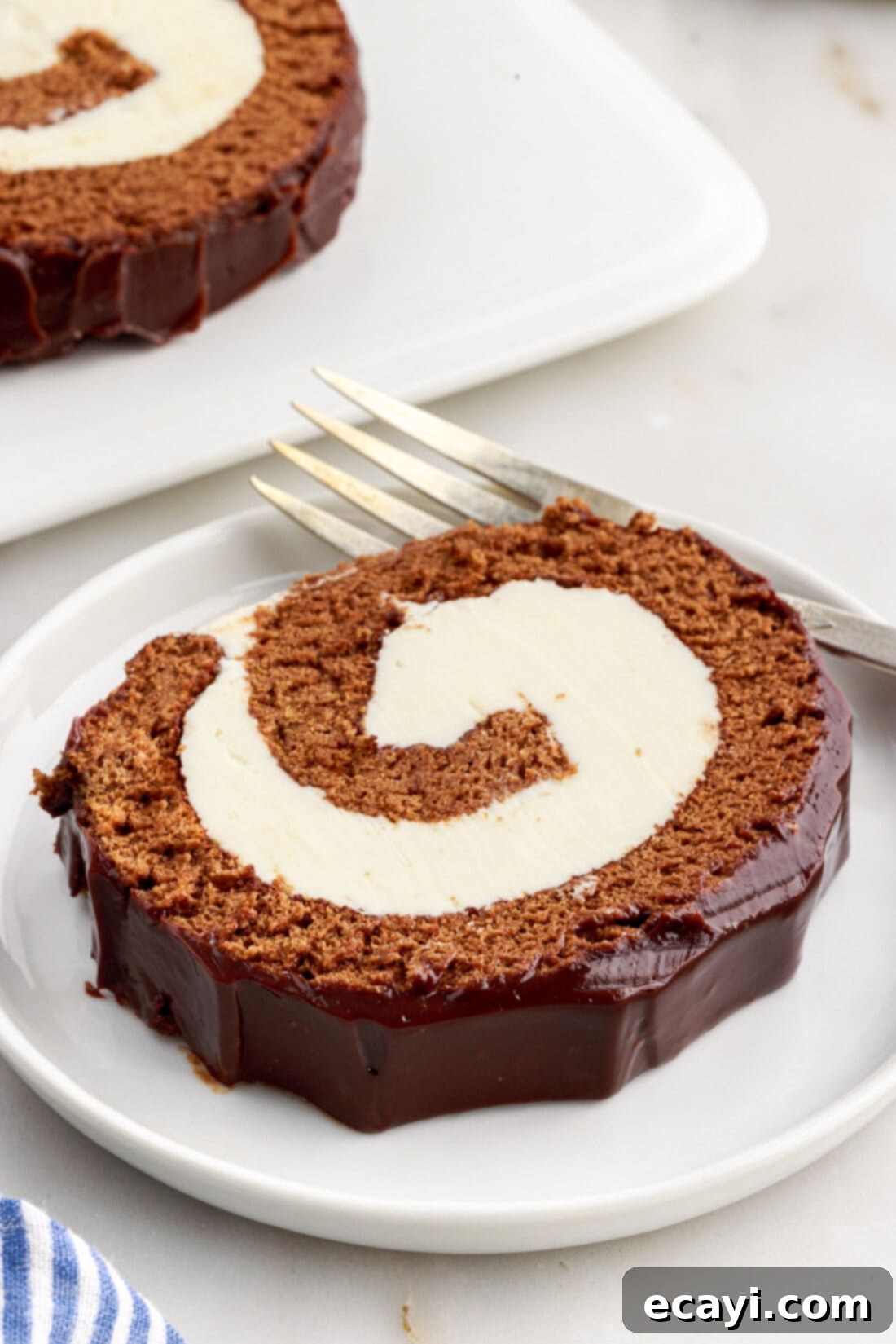 Velvet Chocolate Swirl 3 Slice of Swiss Roll on a plate