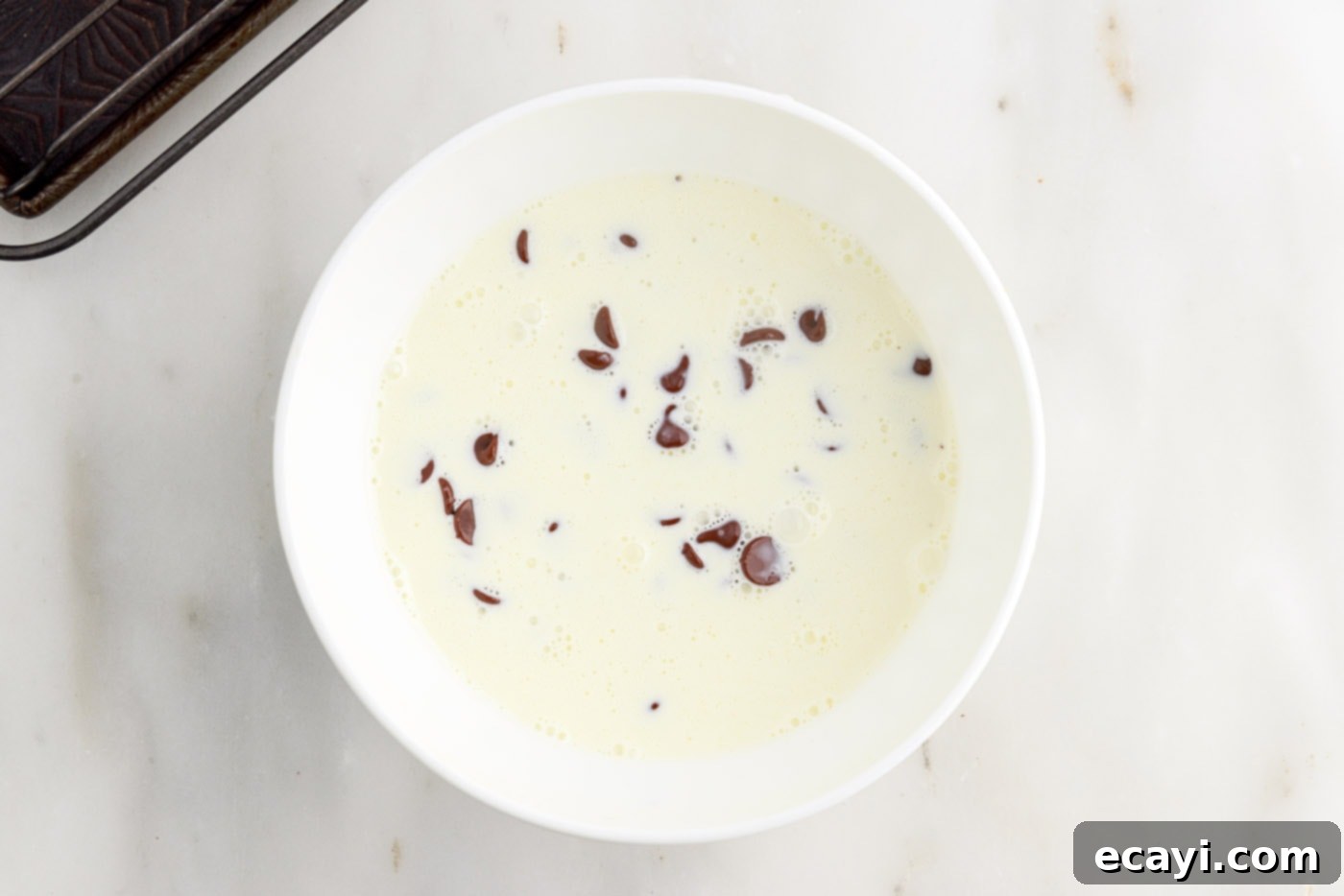 Velvet Chocolate Swirl 24 cream and chocolate chips in a bowl