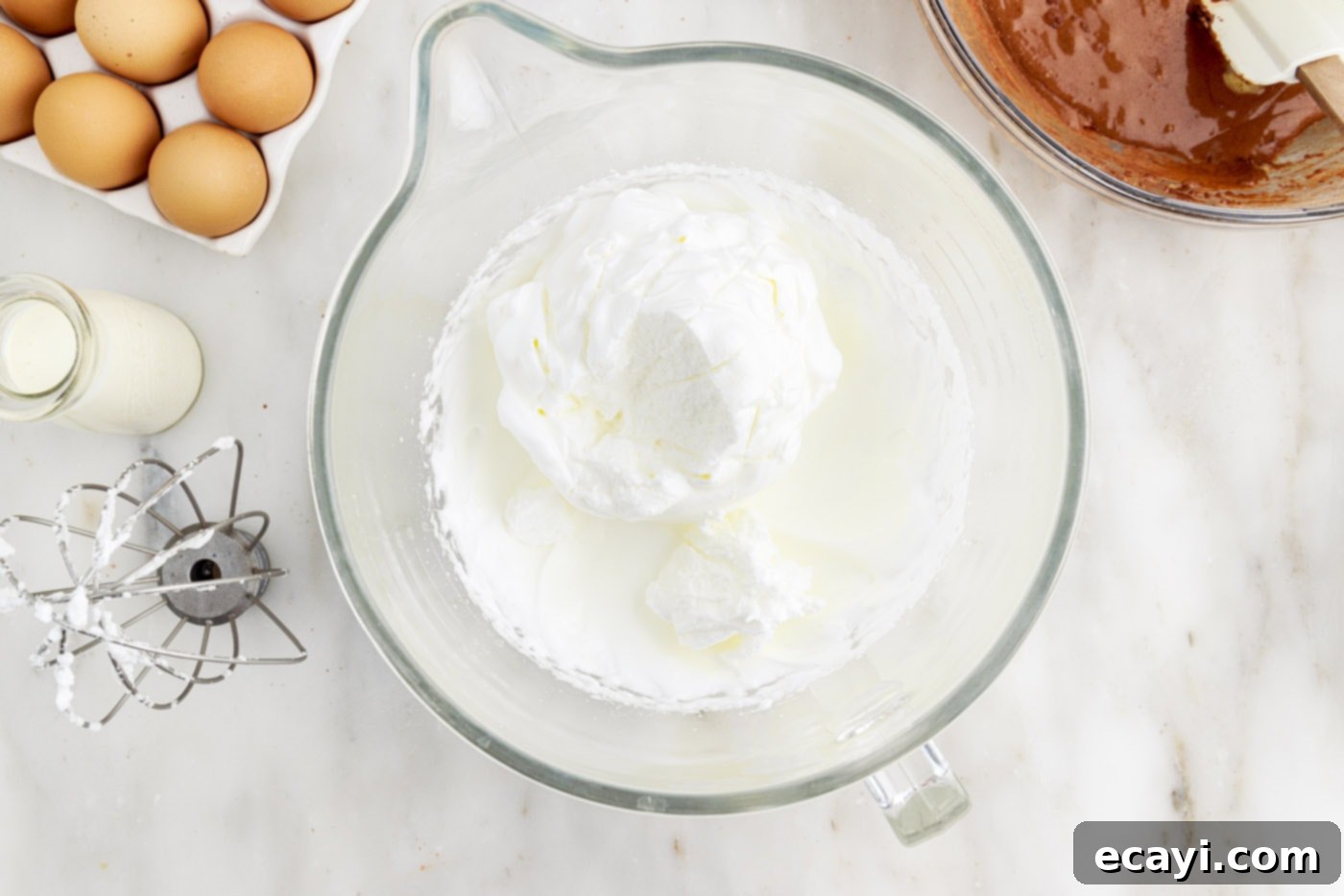 Velvet Chocolate Swirl 6 whipped egg whites in a mixer bowl