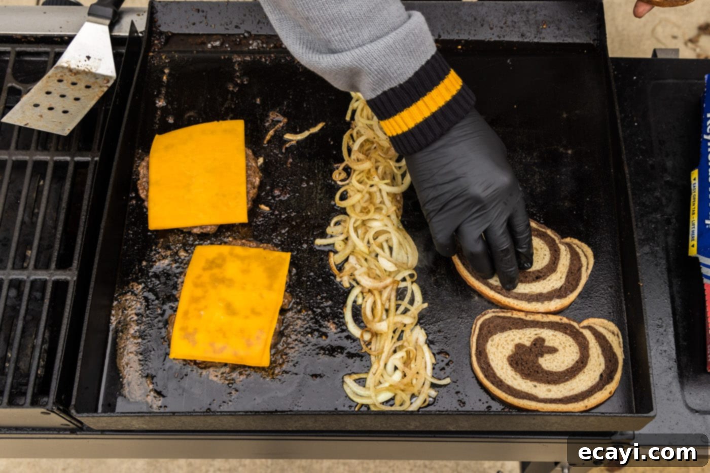 Patty Melt 13 adding rye bread to grill with onions and burger patties