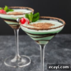 Velvet Grasshopper 14 Two Grasshopper Drinks garnished with a cherry and mint sprig