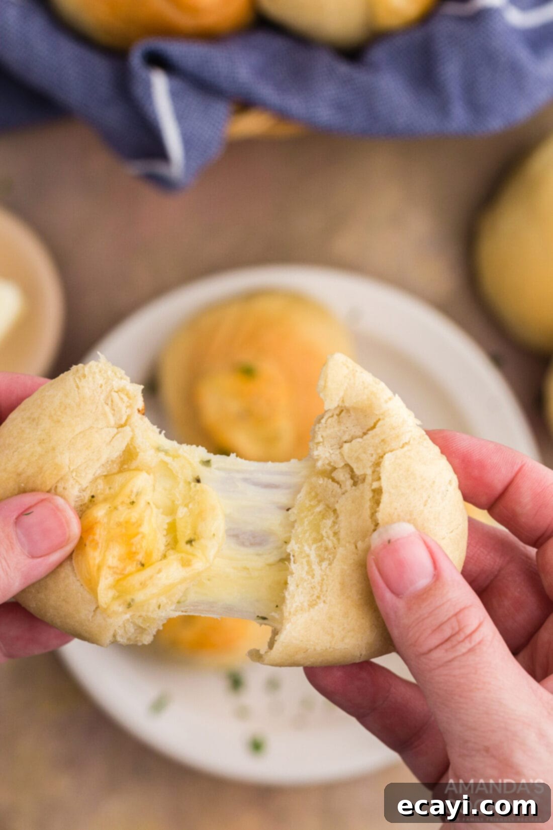 Golden Cheesy Garlic Buns 3 pulling cheese roll apart