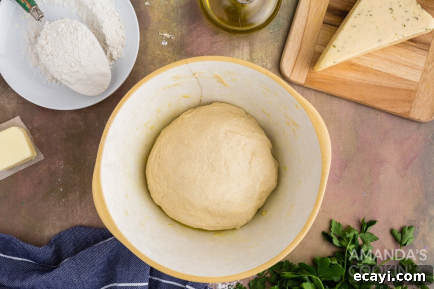 Golden Cheesy Garlic Buns 8 dough ball in a bowl