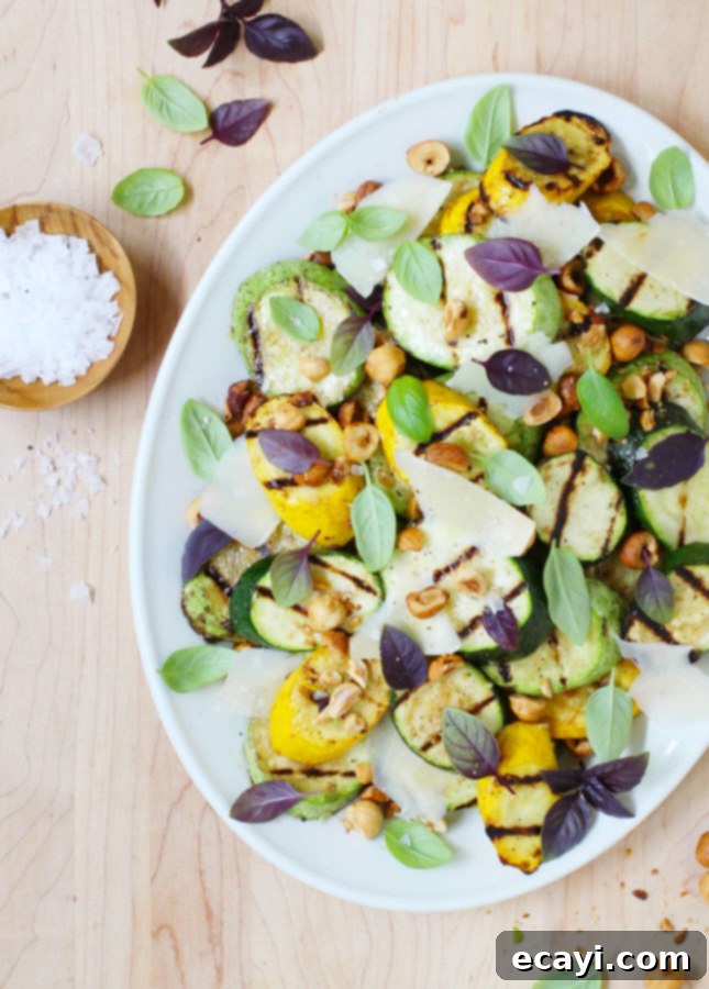 Charred Zucchini, Toasted Hazelnut, and Shaved Parmesan Salad 2 Hazelnut, Parmesan, and Grilled Zucchini Salad: A vibrant summer dish