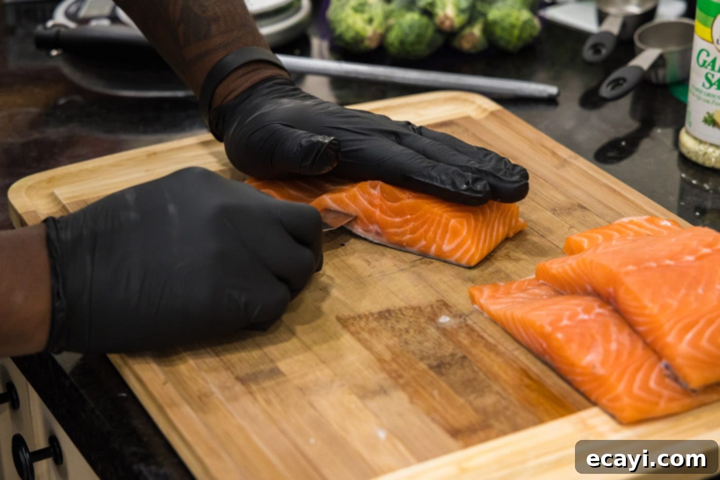 Gourmet Stuffed Salmon 13 slicing into salmon with a paring knife