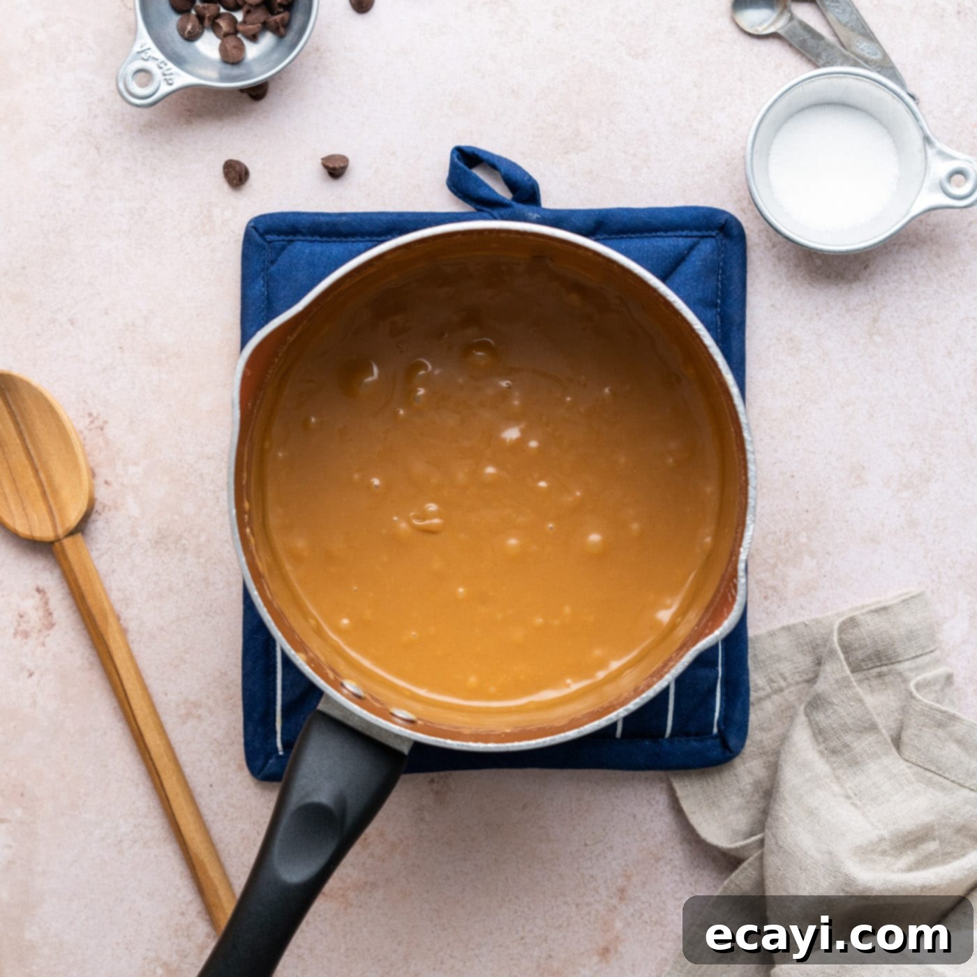 Decadent Millionaire Brownies 15 The finished caramel in a saucepan, thickened and golden, after reaching the soft ball stage.