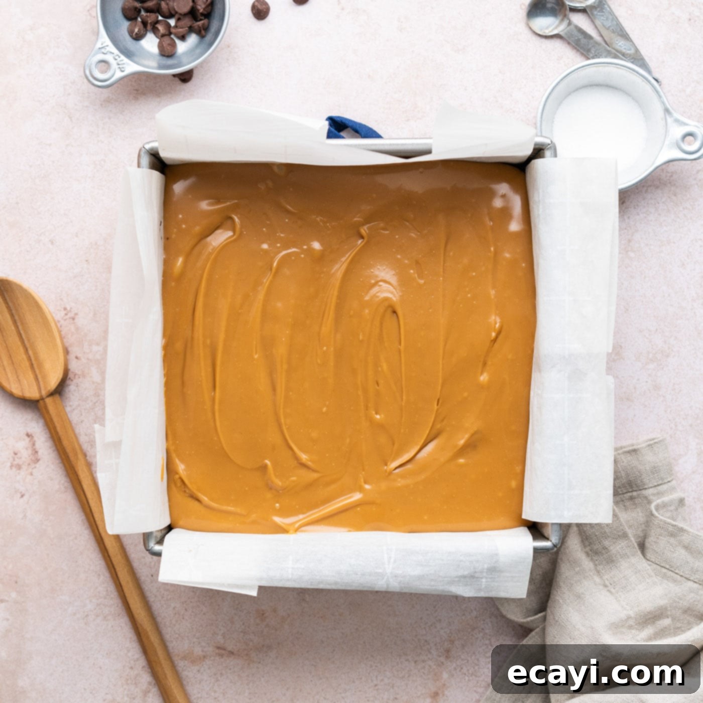 Decadent Millionaire Brownies 16 A smooth, even layer of homemade caramel poured over the cooled brownies in the pan.