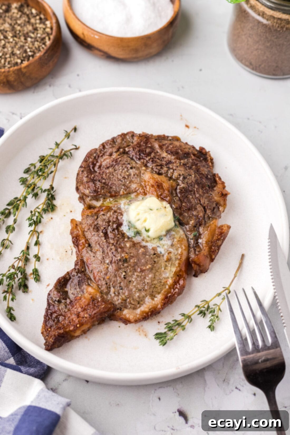 Restaurant-Quality Air Fryer Steak 3 Air Fryer Steak on a plate, garnished and ready for serving.