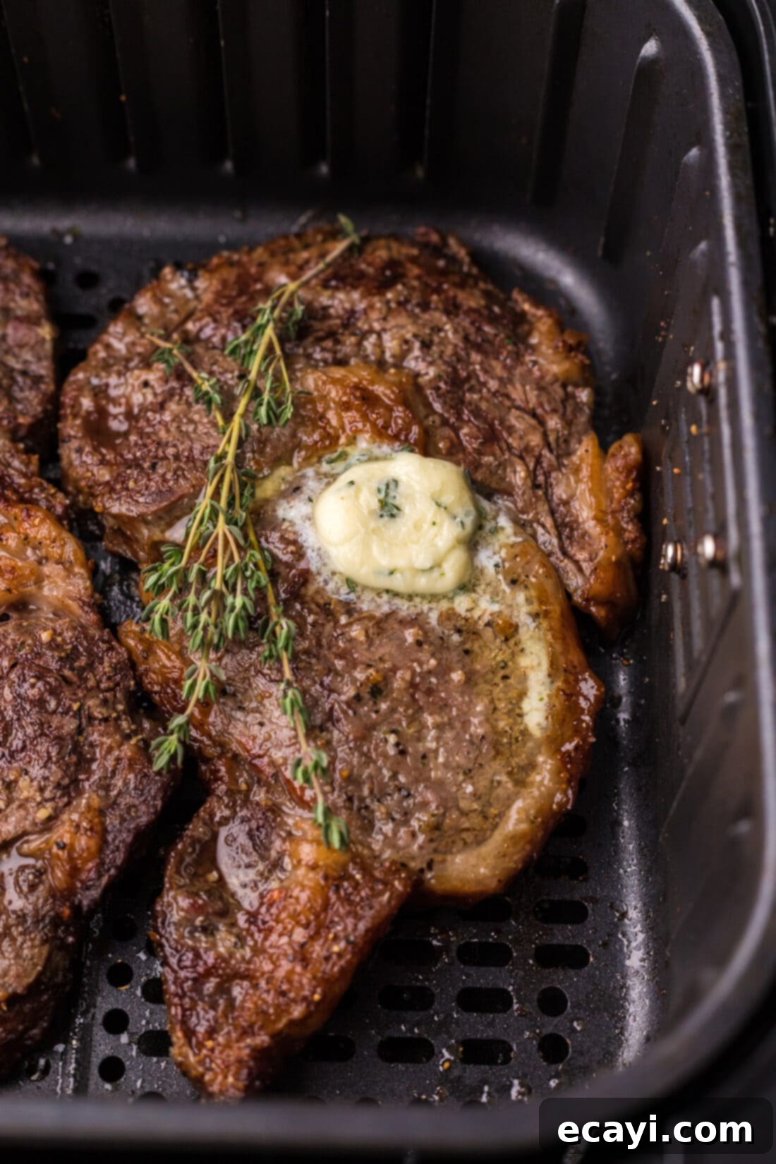 Restaurant-Quality Air Fryer Steak 8 Close-up photo of a perfectly cooked Air Fryer Steak with a beautiful crust.