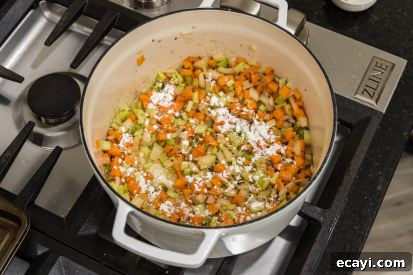 Melt-in-Your-Mouth Braised Beef Shanks 14 Cornstarch sprinkled over the vegetables in a Dutch oven, preparing for thickening