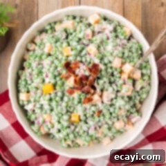 Refreshing Creamy Pea Salad 10 Overhead photo of Pea Salad topped with chopped bacon