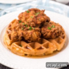 Southern Comfort Bliss 18 Close up photo of Chicken and Waffles on a plate
