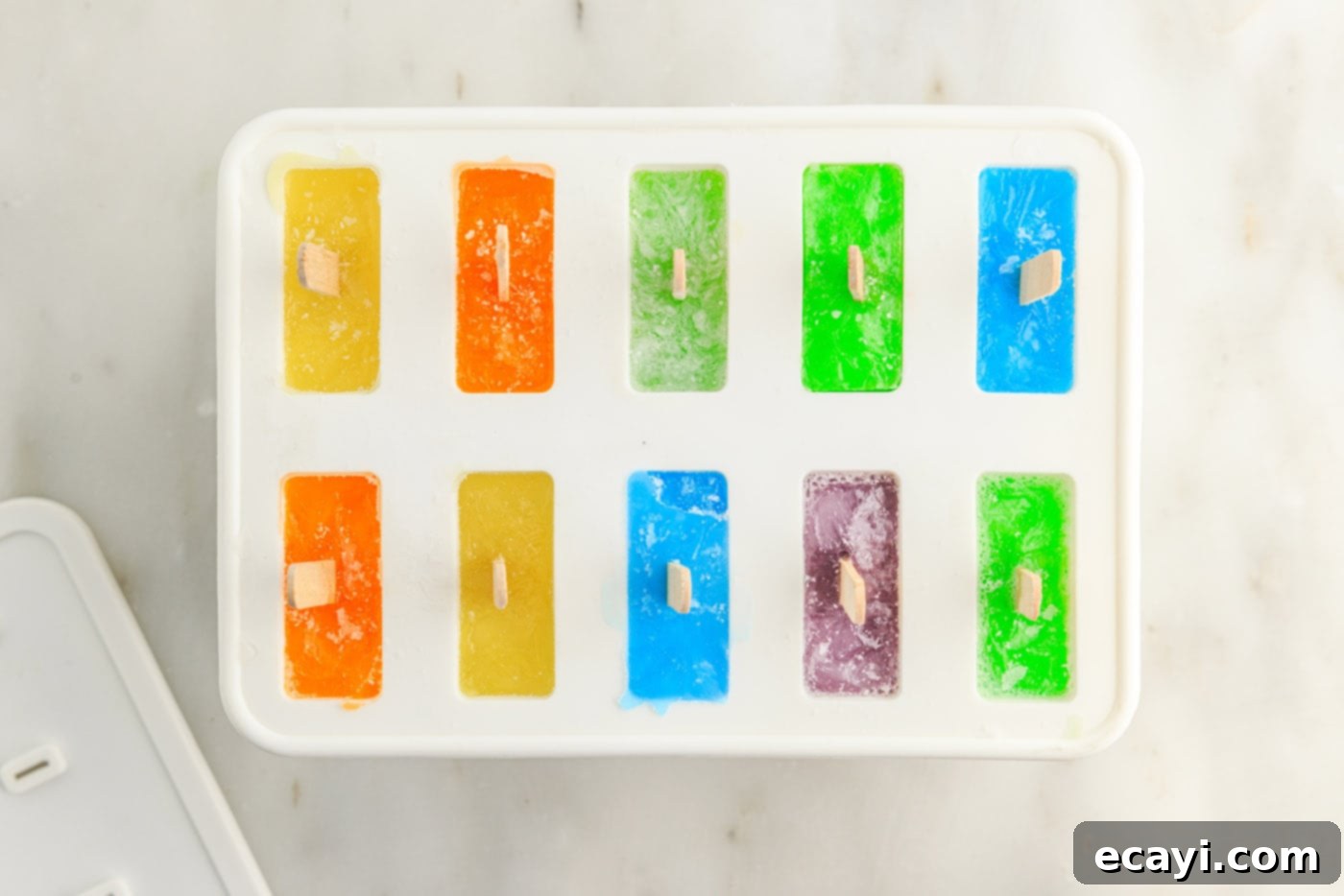 Colorful Gelatin Ice Pops 11 frozen jello popsicles in a mold