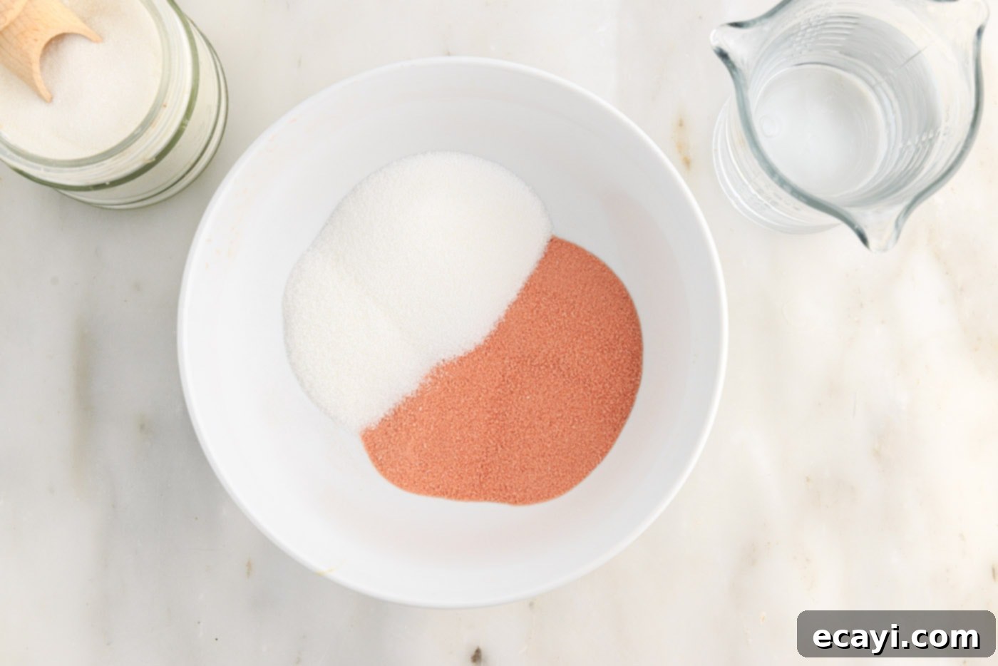 Colorful Gelatin Ice Pops 5 jello powder and sugar ina bowl
