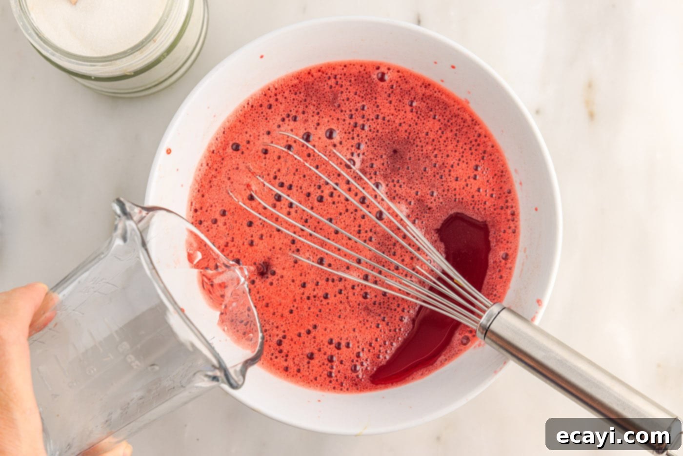Colorful Gelatin Ice Pops 7 pouring cold water into jello mixture
