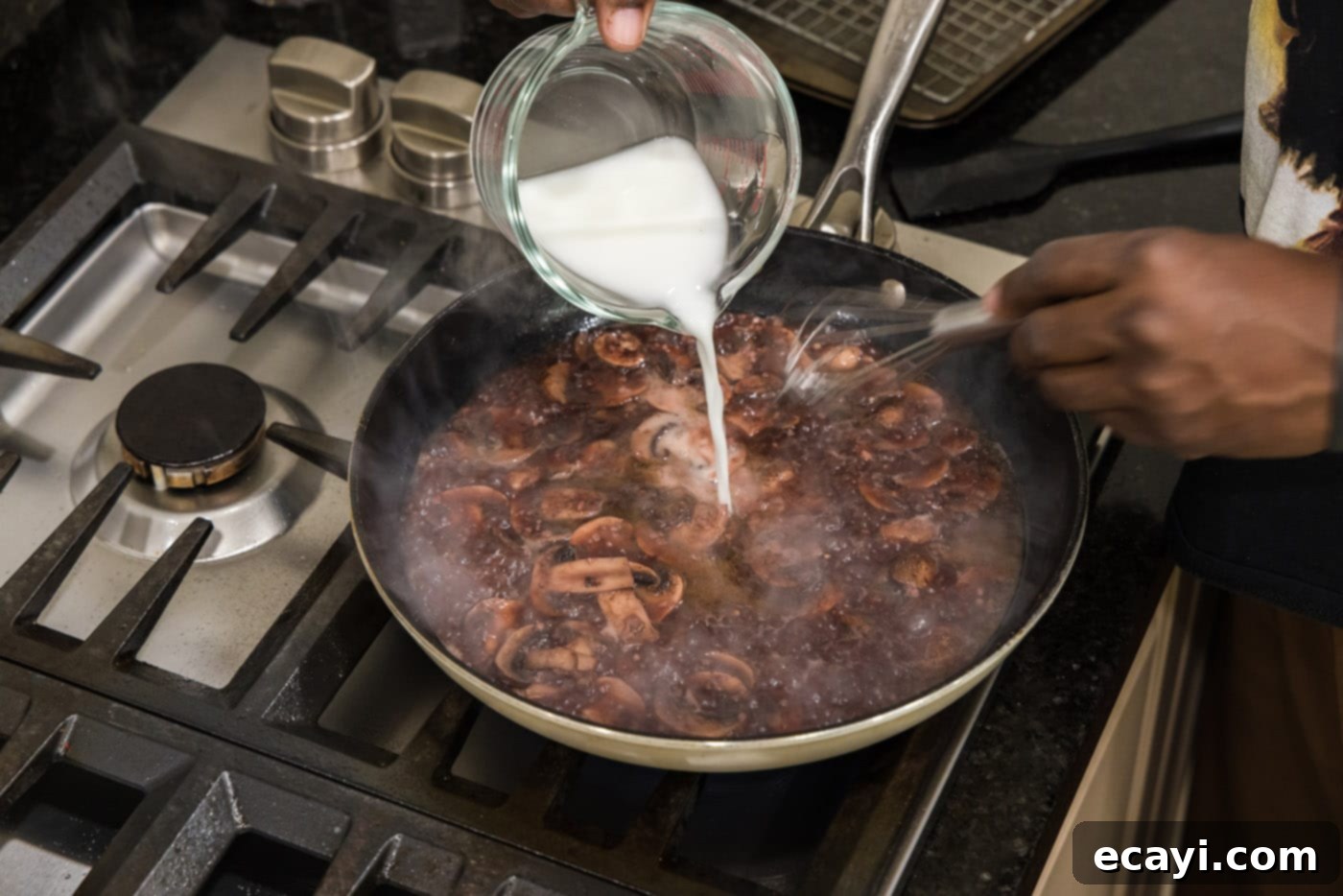Classic Veal Marsala 13 Pouring a cornstarch slurry into the simmering mushroom Marsala sauce to thicken it.
