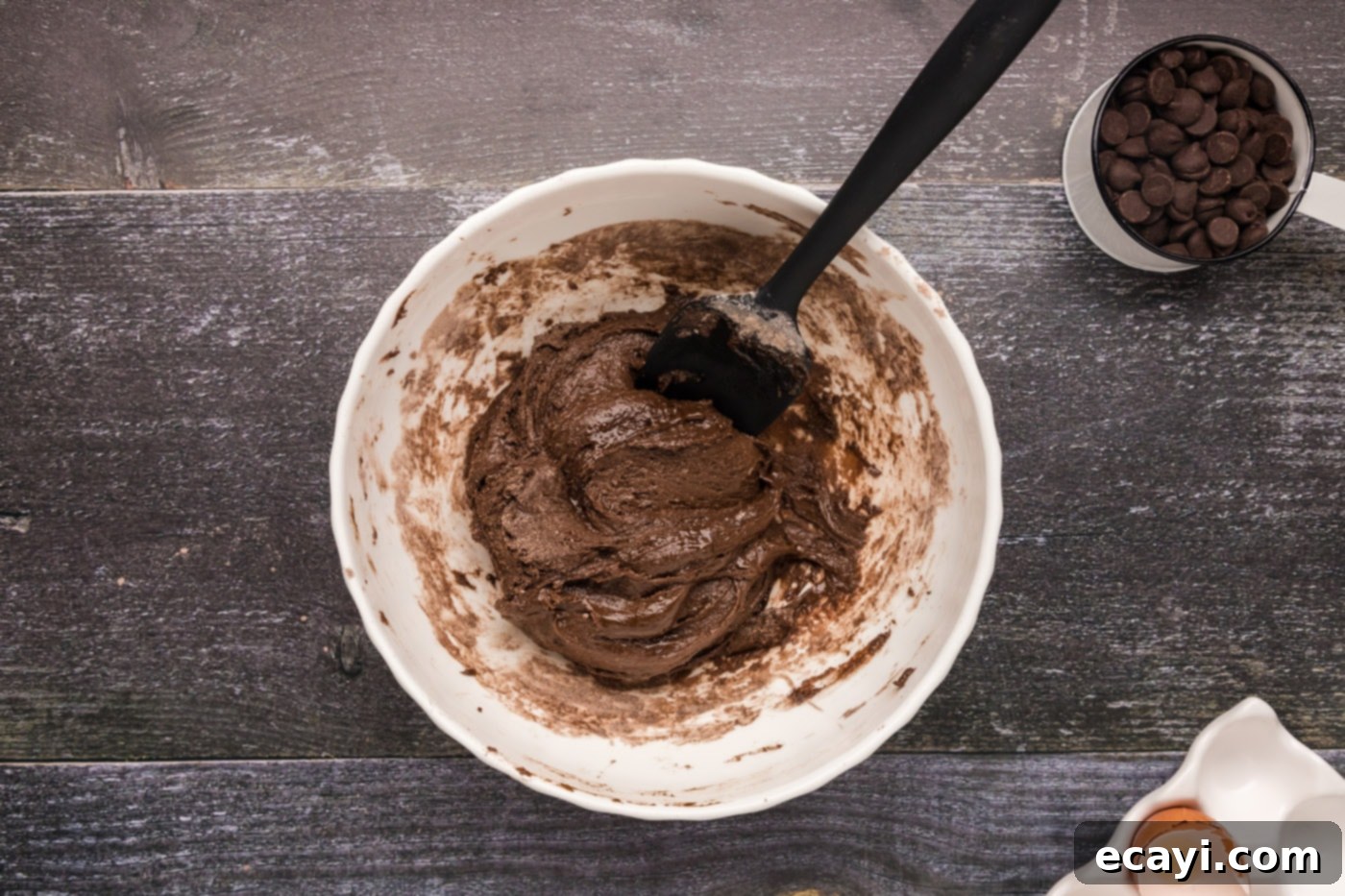 Foolproof Cake Mix Brownies 8 thick chocolate cake mix brownie batter in a bowl after mixing