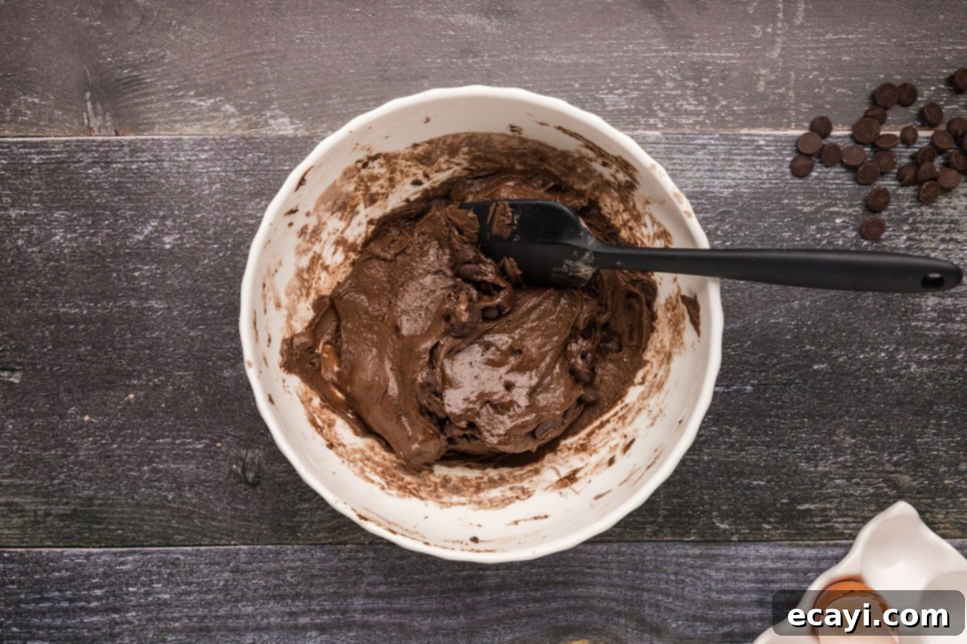 Foolproof Cake Mix Brownies 10 brownie batter with dark chocolate chips stirred in, ready for the pan